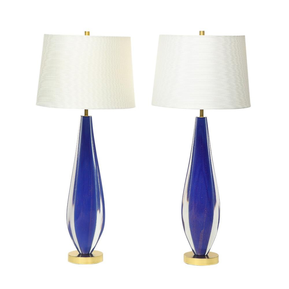 Flavio Poli Lamps, Sommerso Glass, Blue, Gold, Seguso, Murano. Pair of handblown Sommerso glass lamps in lapis blue, gold, and clear. Shade dimensions: 10