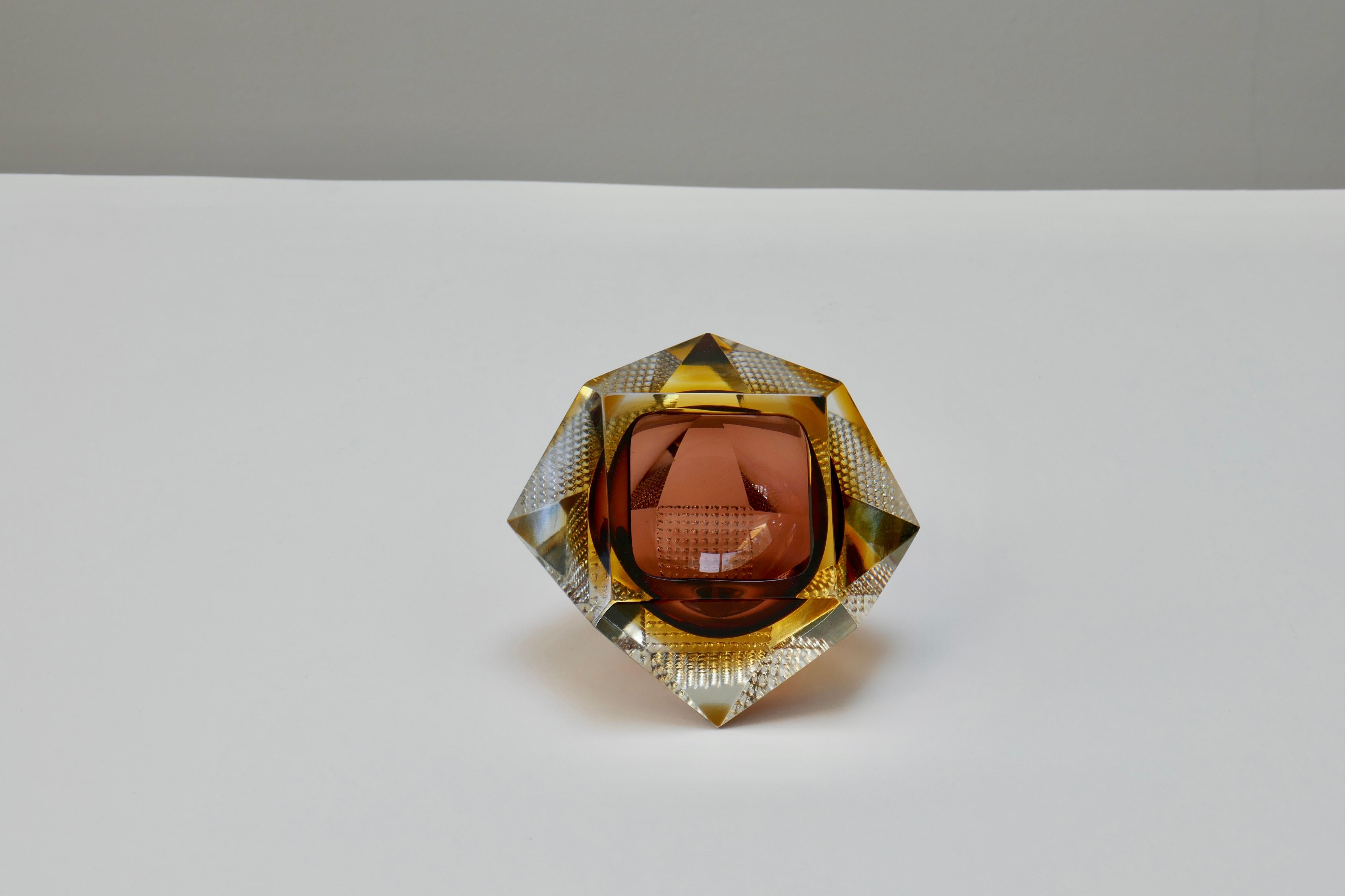 Midcentury Murano diamond-shaped ashtray / vide poche signed  Flavio Poli for Seguso Vetri d'Arte (Murano, Italy, 1960s). It is made according to the technique of Sommerso which allows to superimpose several layers of glass and obtain effects of