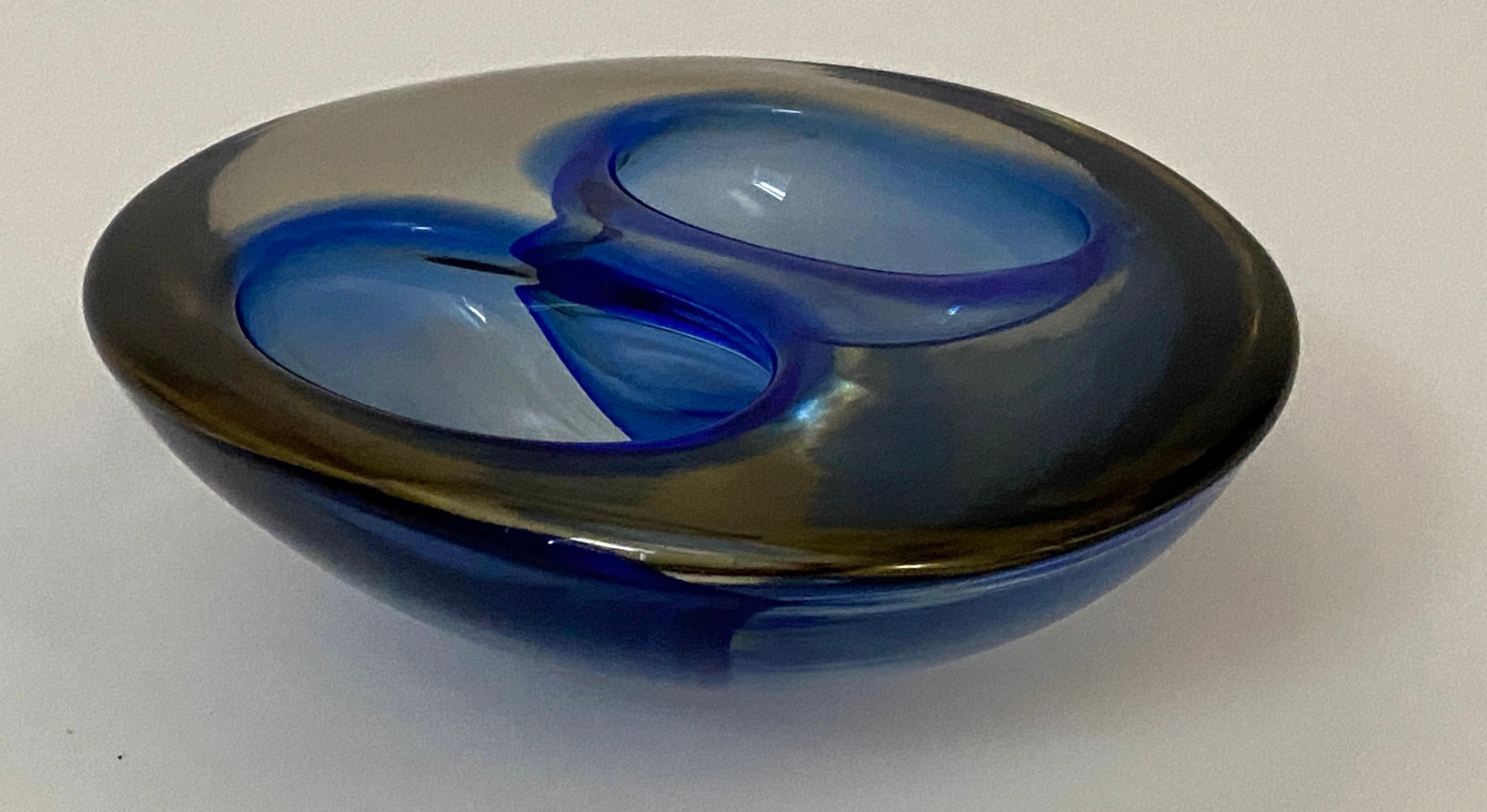 This piece of Murano art glass was created by Flavio Poli between 1964-1966, and is a rare masterpiece, with its form, coloration and sommerso technique.

Note: This piece weighs 4.65 lbs.

Note: We have the same form in a different coloration