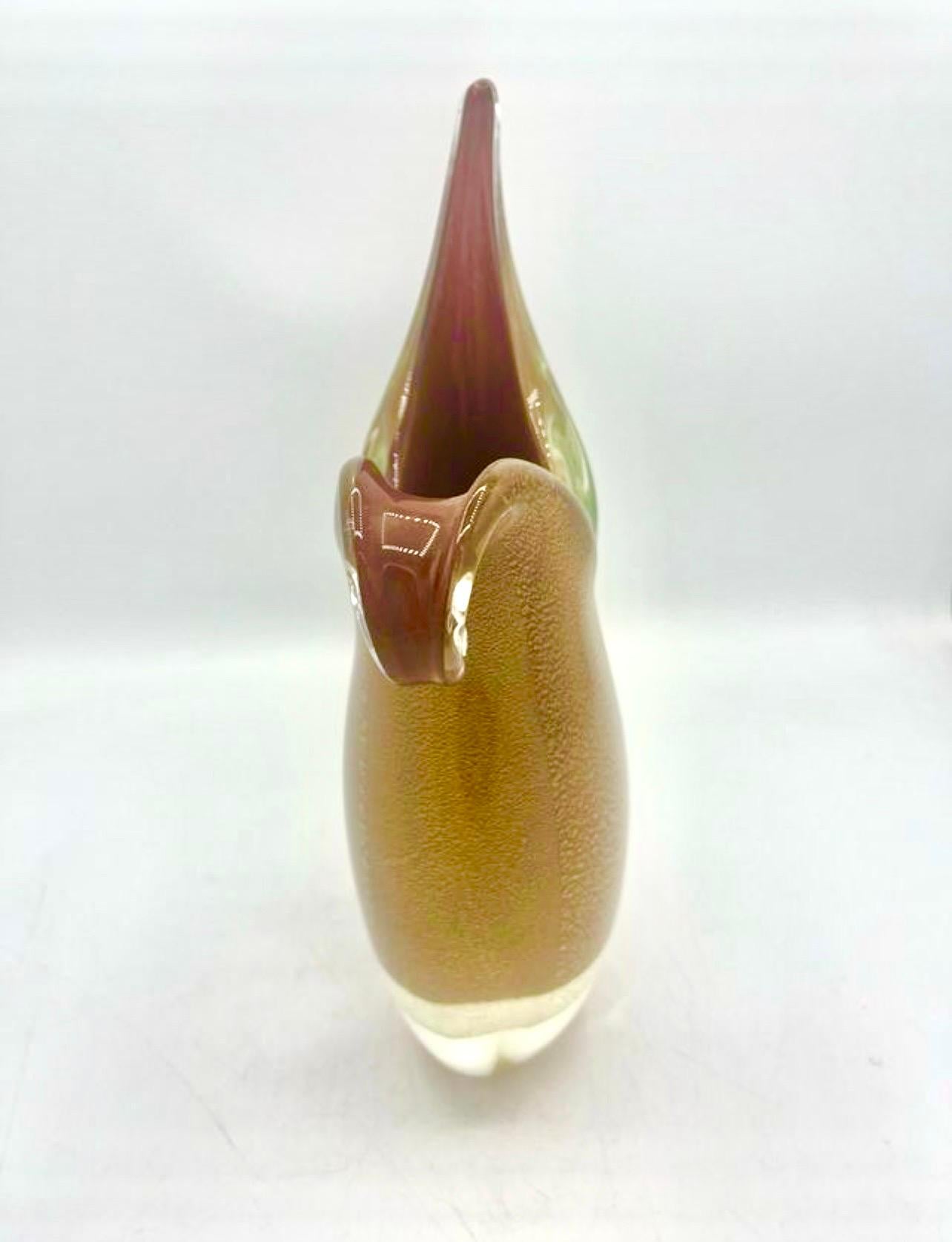 Murano art glass sculptural vase in gold inlaid. Designed by Flavio Poli and manufactured by Seguso Vetri d'Arte. Italy, 1970s. Brilliant colors: Gold glass inlaid in clear glass using the Sommerso technique. Amazing organic design and eye-catching
