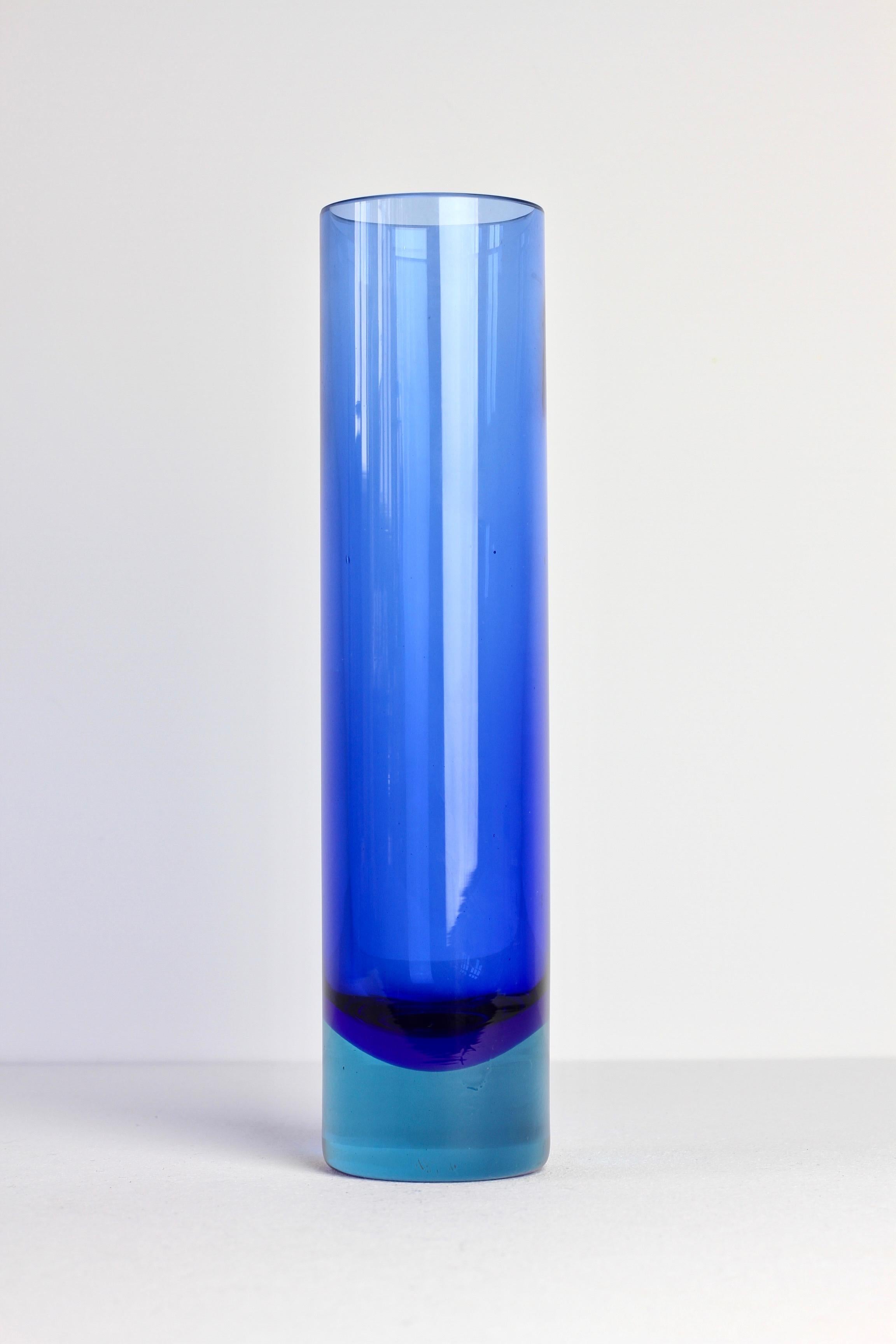 Flavio Poli style Murano glass vase. An absolutely lovely color combination of light blue over sapphire blue 'Sommerso' or 'Submerged' glass technique.

The exact maker and production date is not yet known to us but, we believe, this vase was made