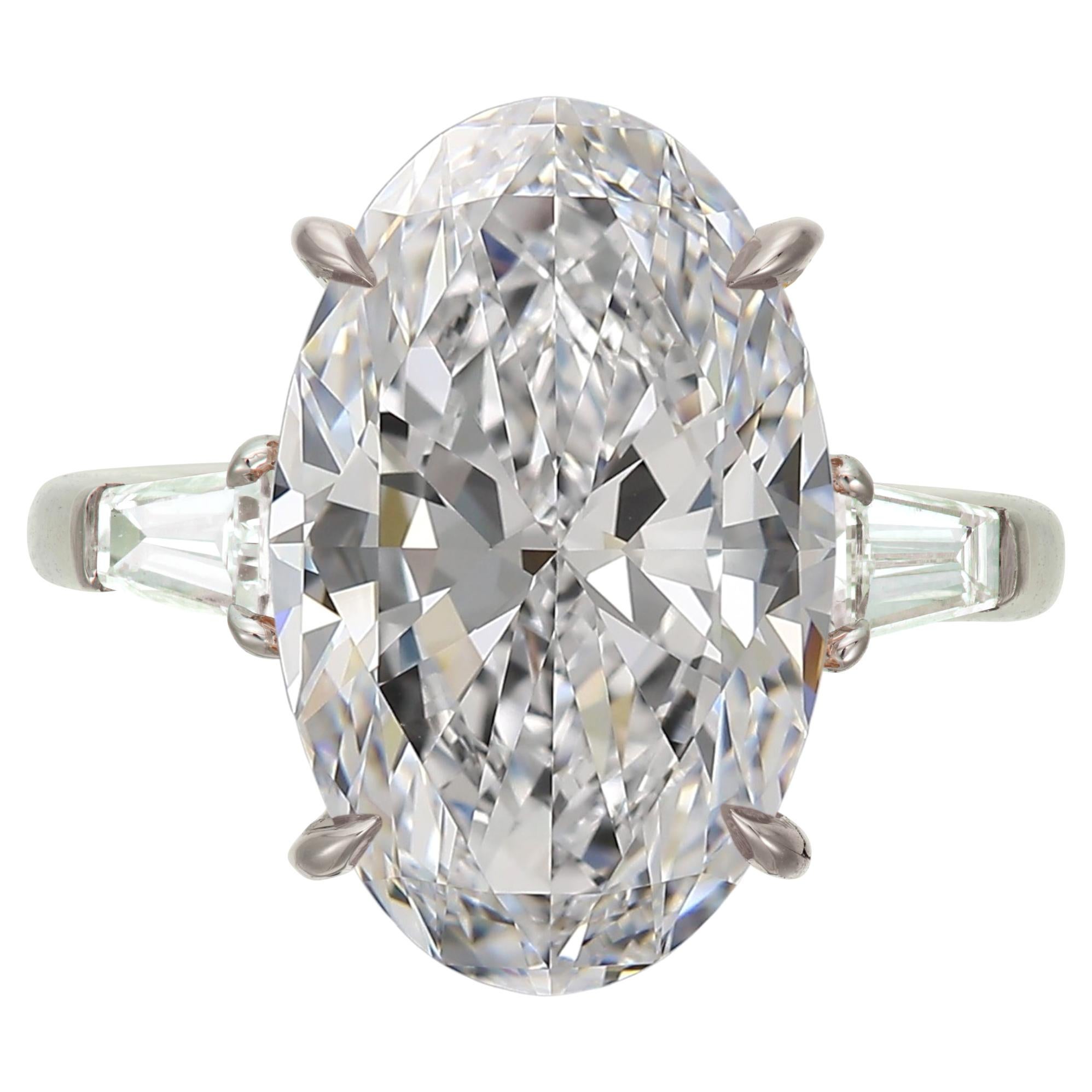 GIA Certified 7.02 Carat Oval Diamond Tapered Baguette Ring