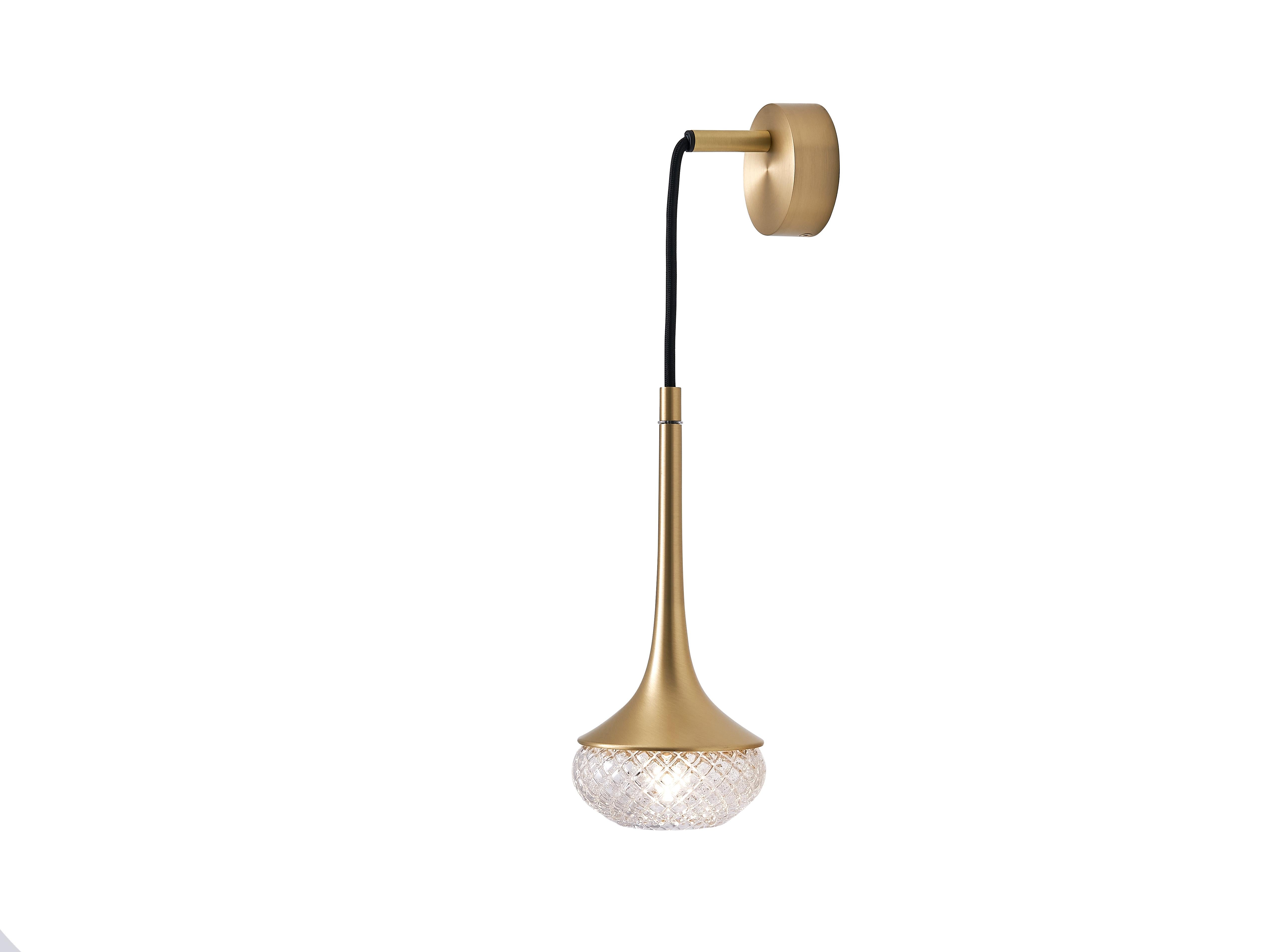 Flea Brass Wall Light by Emilie Cathelineau
Dimensions: D11.5 x W15 X H33.5 cm
Materials: Solid brass,Mouth-blown glass,Textile cable
Others finishes and dimensions are available.

All our lamps can be wired according to each country. If sold