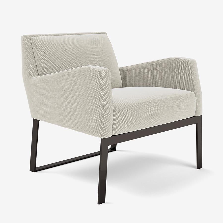 This Fleet Street lounge chair by Yabu Pushelberg is upholstered in Geneva Avenue textured wool. Geneva Avenue comes in 5 colorways from Germany with a composition of 96% Virgin Wool and 4% Polyamide, a weight of 1010g/m and a Martindale of 90,000