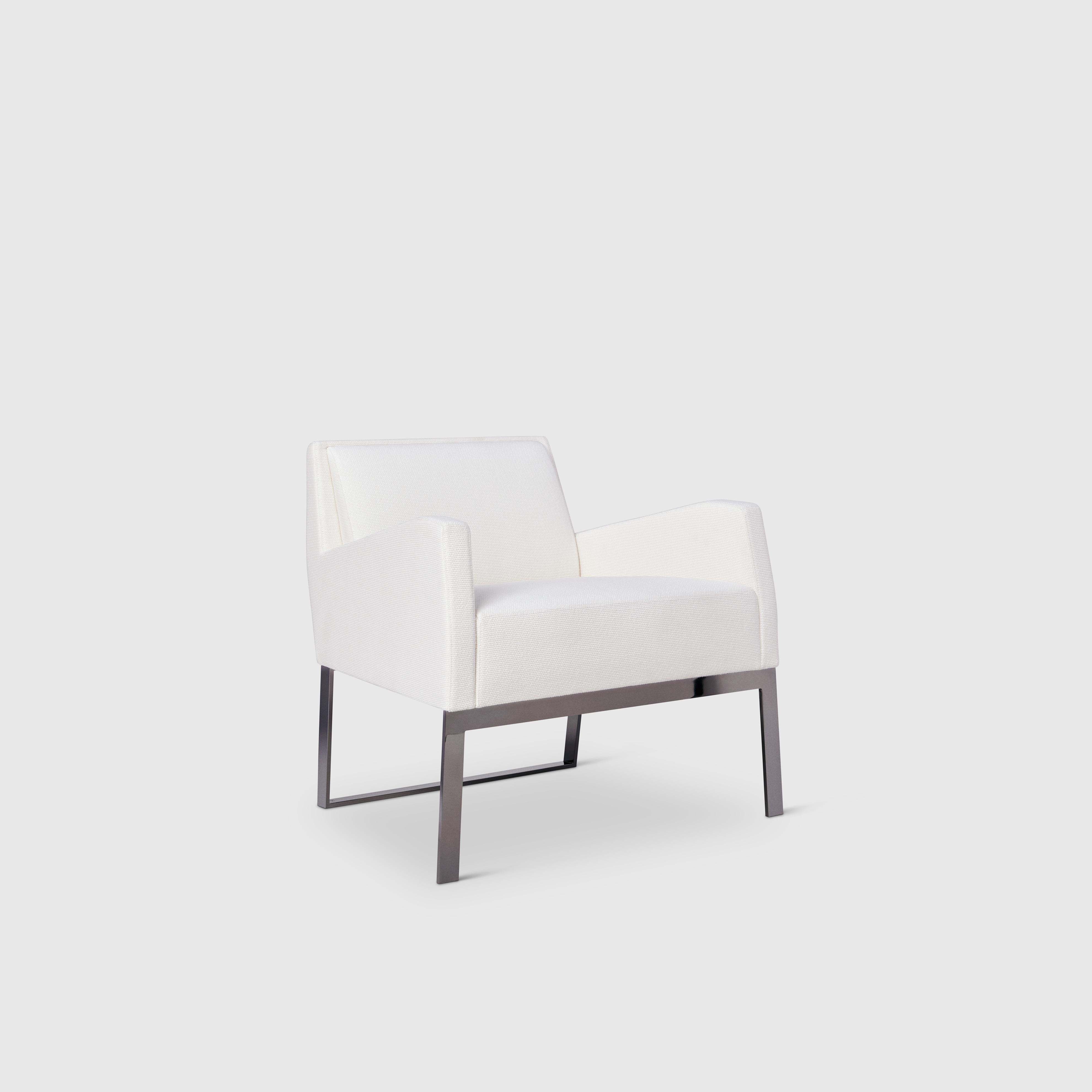 Yabu Pushelberg have cut the Fleet Street lounge chair with sharp lines. Crafted in Italy the tailored chair is available upholstered with tufted channels or without in fabric or leather and is paired with a polished black nickel finish