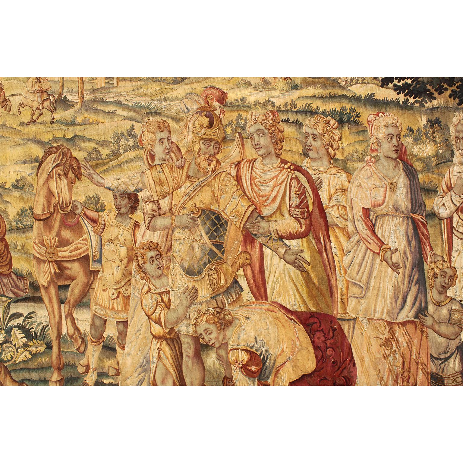 A fine and large Flemish 17th-18th century Baroque figural historical tapestry fragment. The large tapestry depicting an allegorical Royal family scene of a warrior meeting his new born child surrounded by his family and Royal members of the Court,