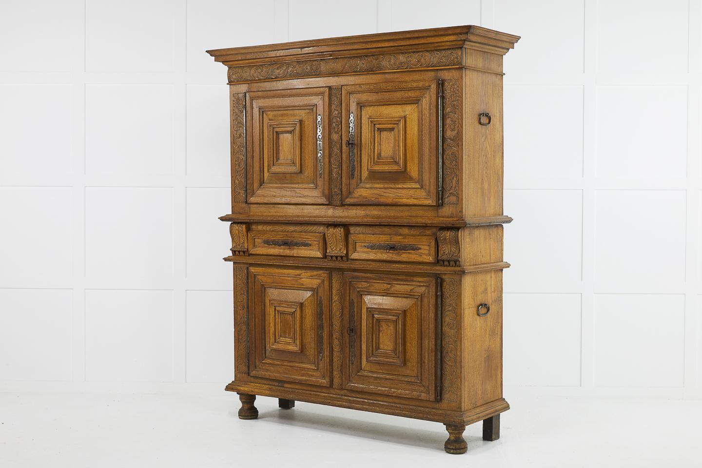 Flemish 17th century carved oak cabinet. Small and nicely proportioned.