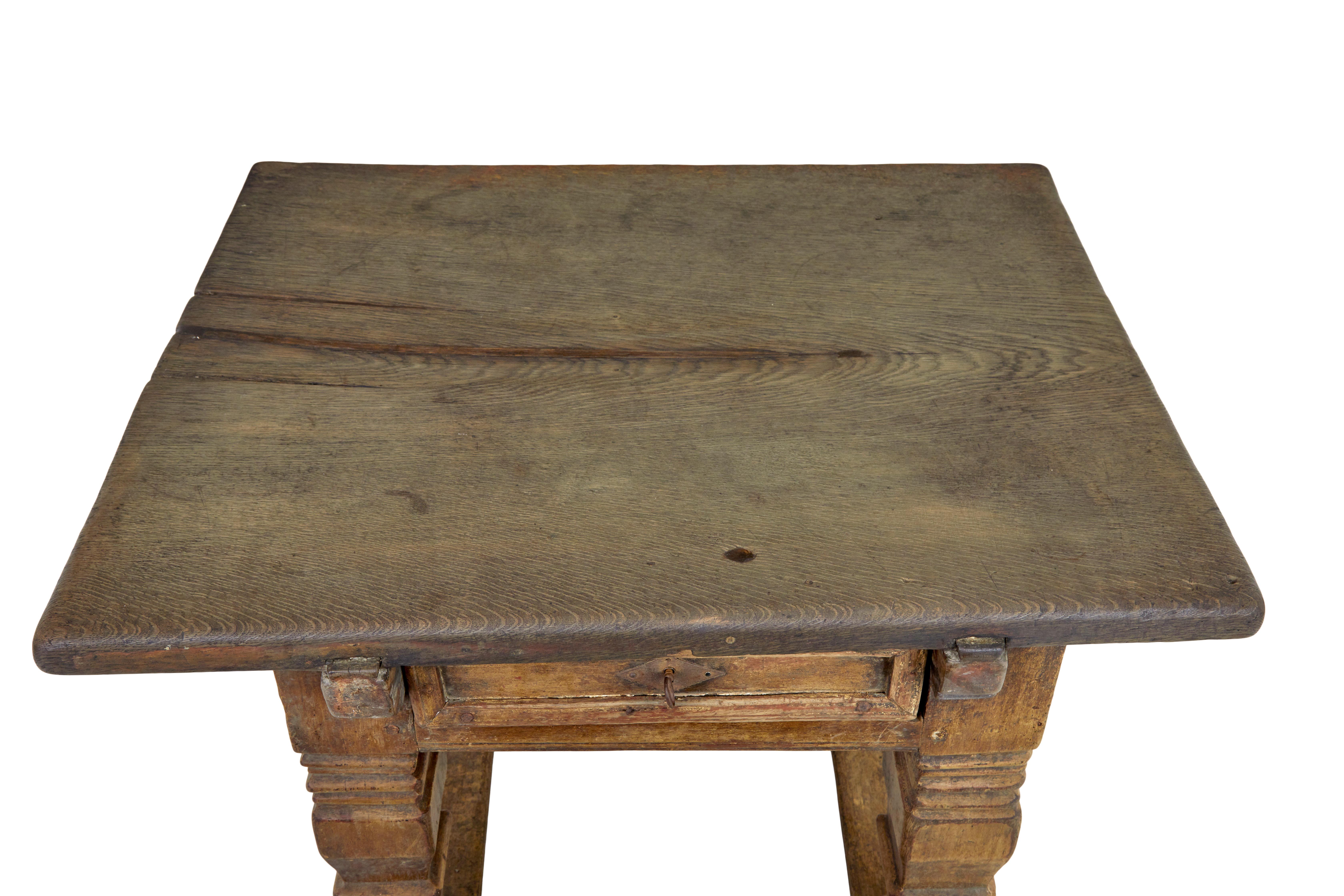 Flemish 17th century carved oak table circa 1690.

We are pleased to offer this 17th century table which was often called a rent table.

Over-sailing solid oak top which has now been restored with a piece let in and areas of colour matched fill. 