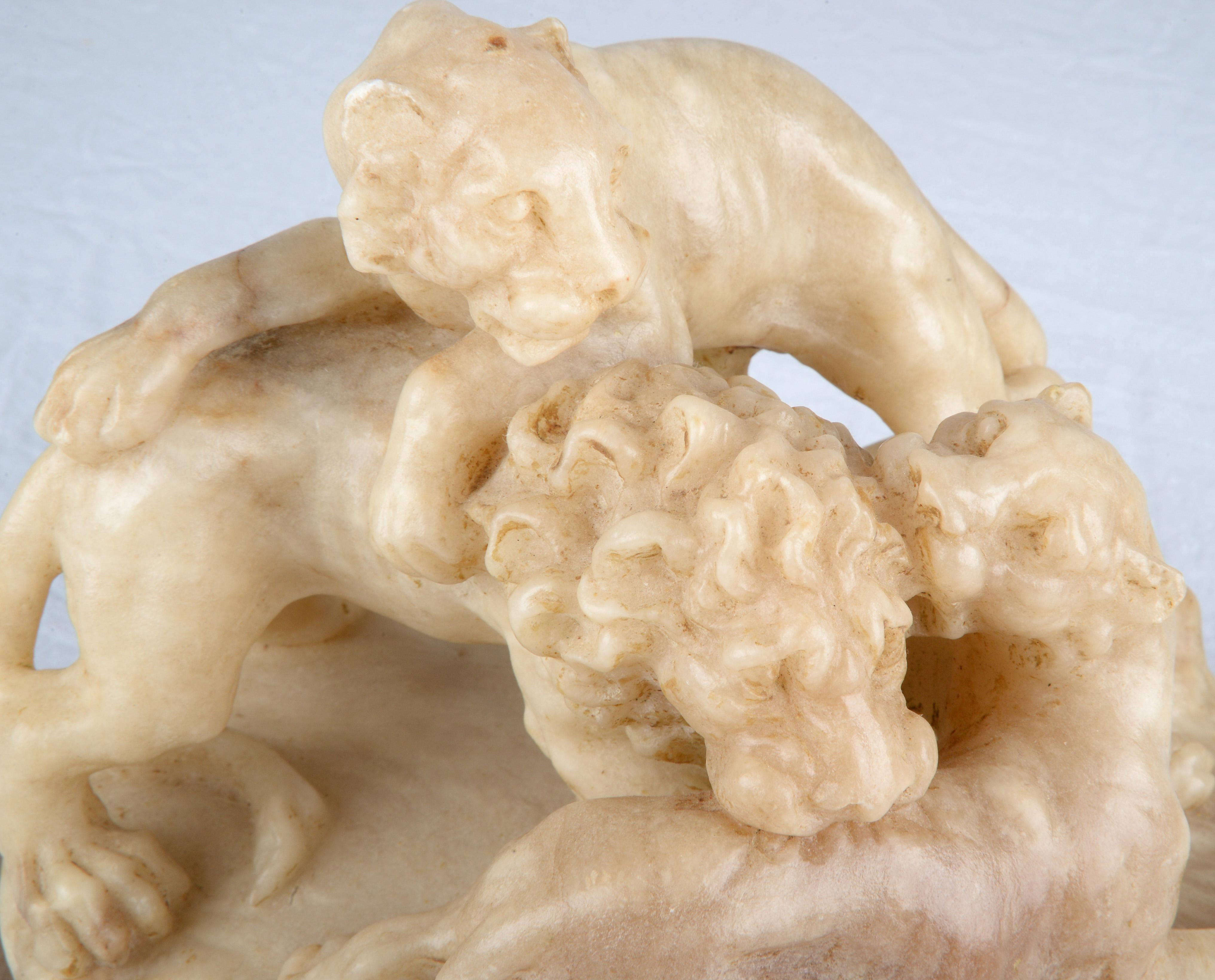 Alabaster group of three lions playing on a naturalistic base, raised on a gilt-edged plinth.

From England, Spain, and France, to the Low Countries, Germany, and Poland, alabaster was a popular material in European sculpture, in particular between