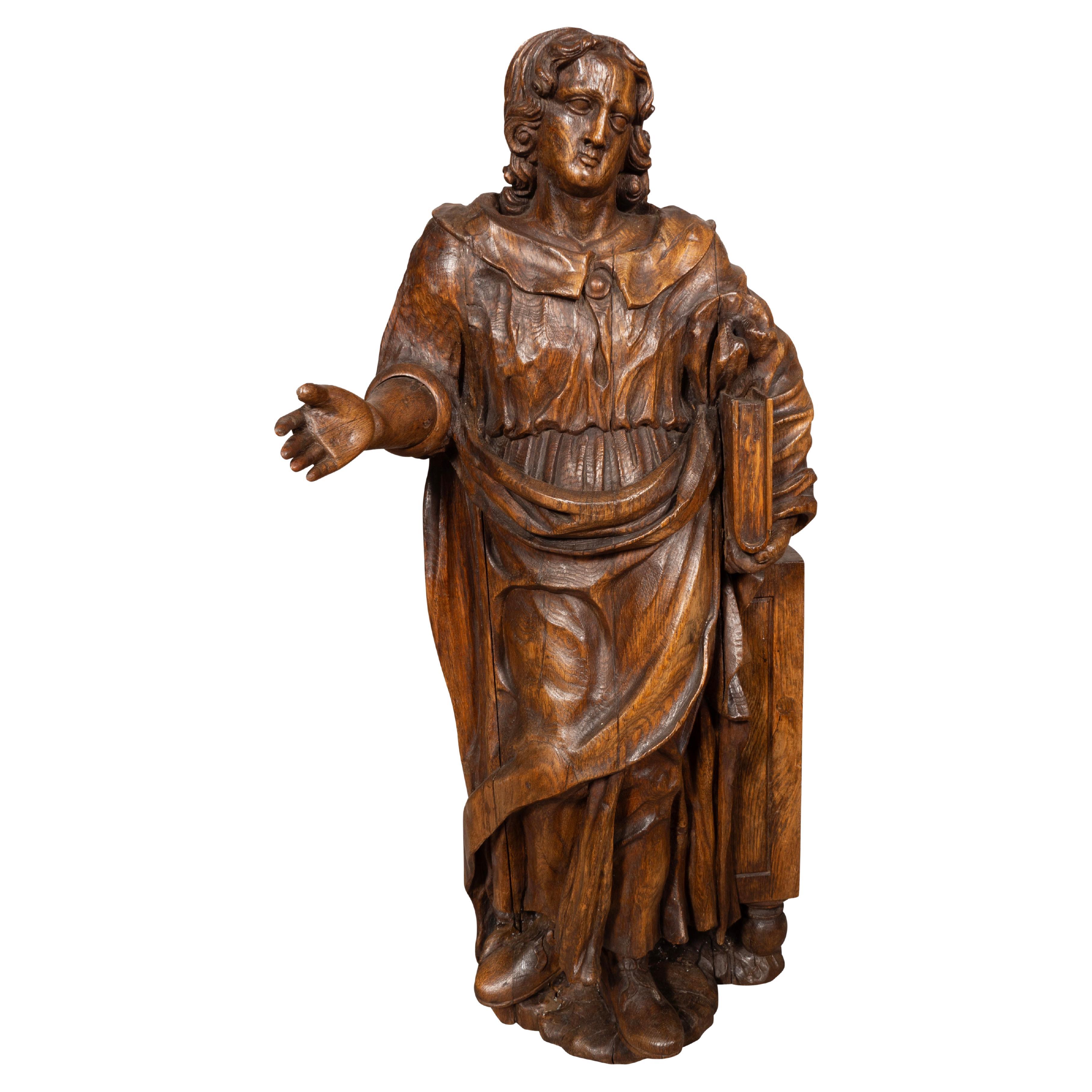 Flemish Baroque Carved Oak Figure Of A Scholar For Sale