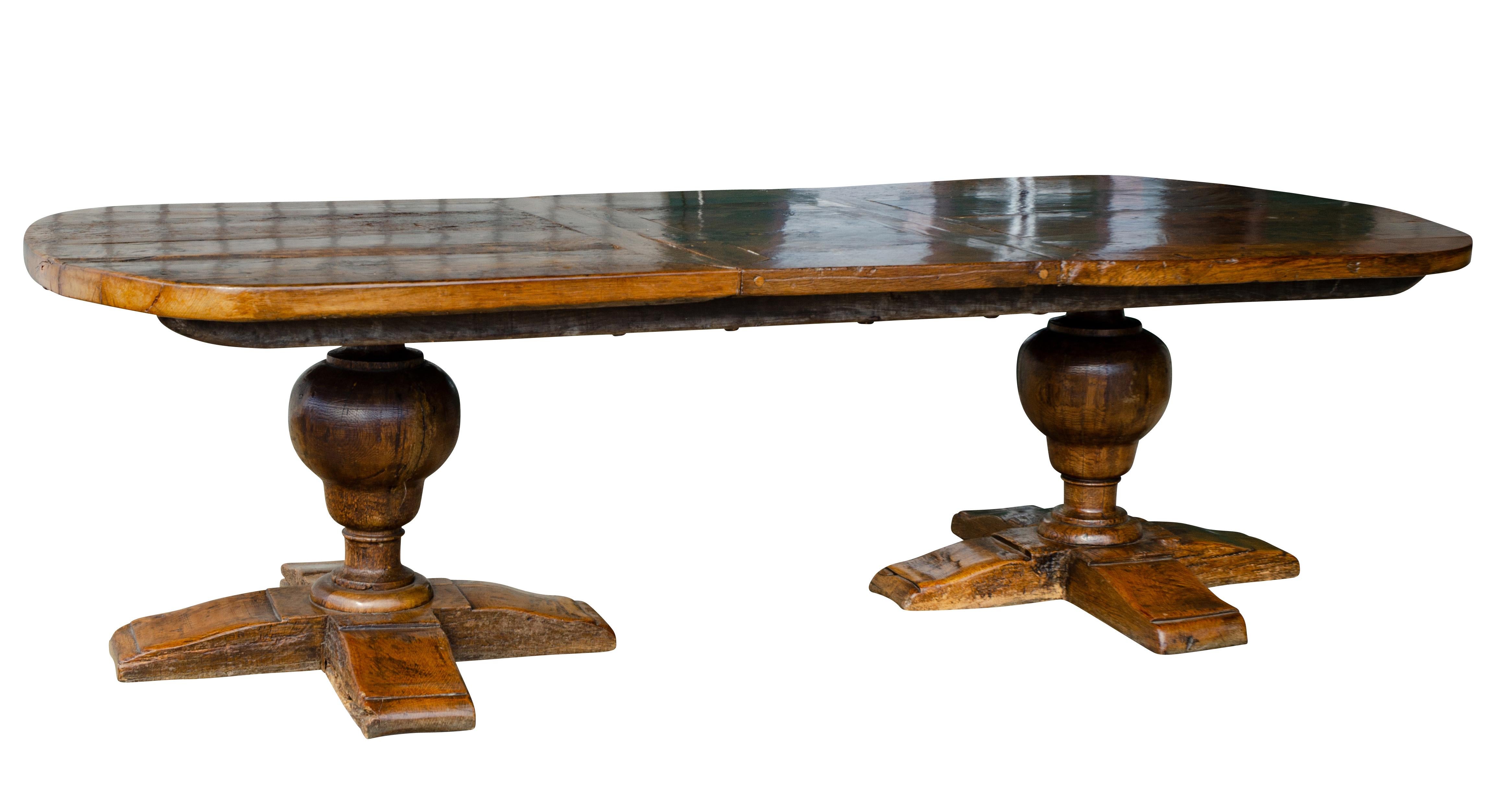 Constructed of early elements. Thick top assembled in three sections dowelled together. Bulbous turned supports and four part molded plank feet. Provenance, Davidson Antiques, Jermyn St, London.