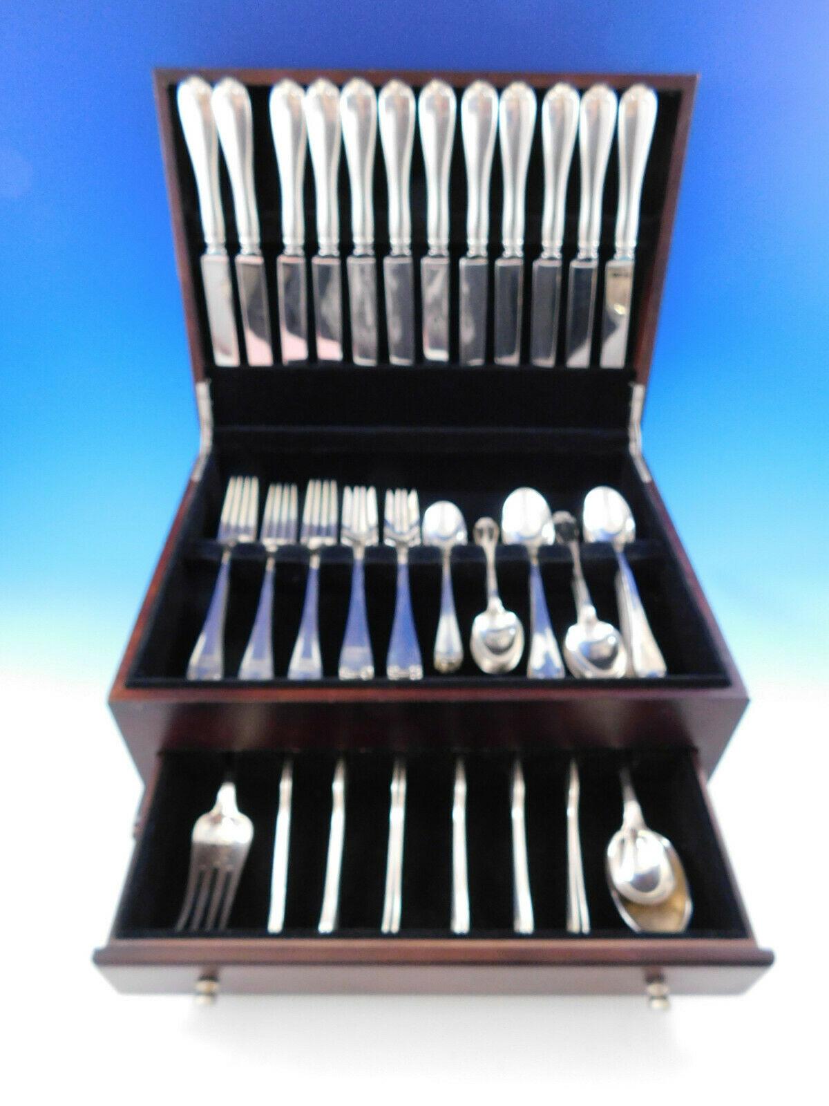 Superb Flemish by Tiffany & Co. sterling silver dinner size flatware set - 75 pieces. This set includes:

12 dinner size knives, 10 1/8