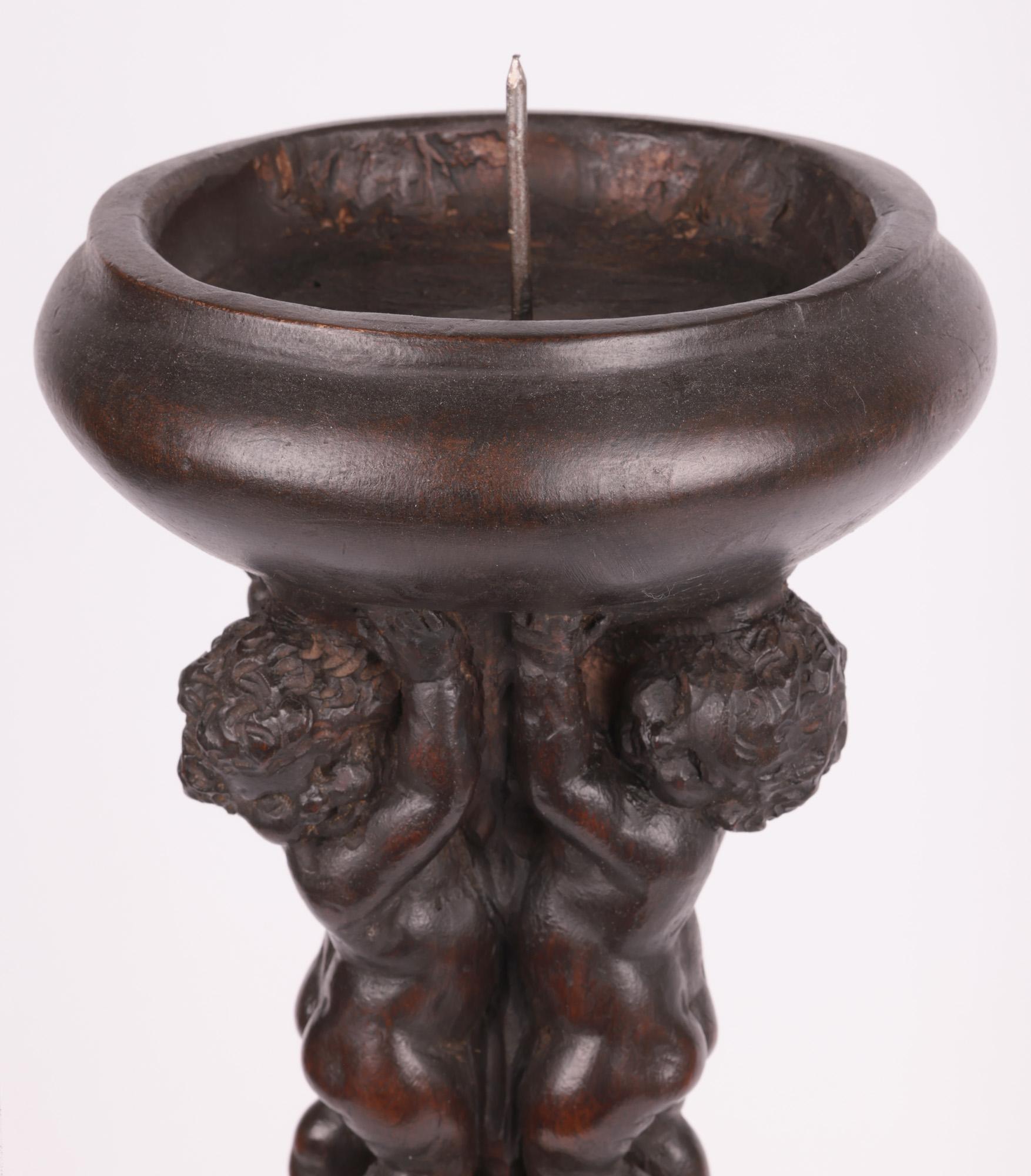 Flemish Carved Pricket Candlestick with Putti Late 16th or Early 17th Century For Sale 9
