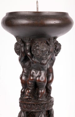 Flemish Carved Pricket Candlestick with Putti Late 16th or Early 17th Century
