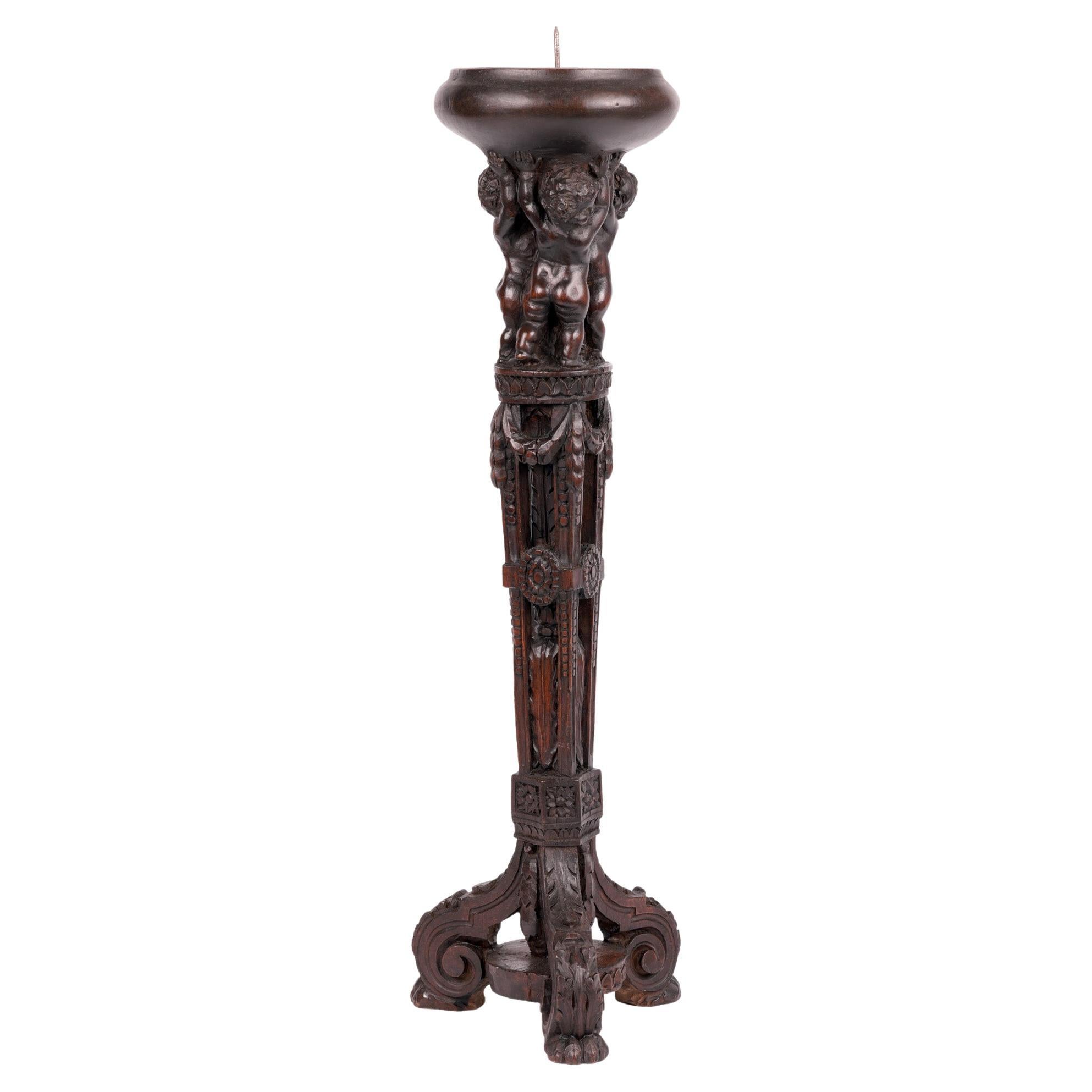 Flemish Carved Pricket Candlestick with Putti Late 16th or Early 17th Century For Sale