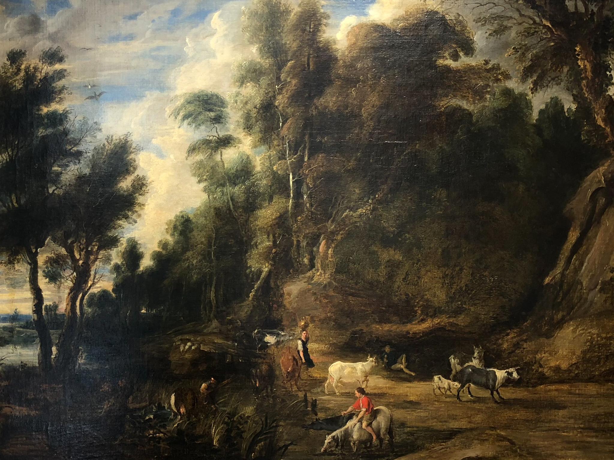 This Baroque Flemish painting represents a landscape along with four figures and different types of animals. It’s a copy of Peter Paul Rubens’ (1577-1640) painting, The Watering Place (1615-22), exhibited in the National Gallery of London. 
The
