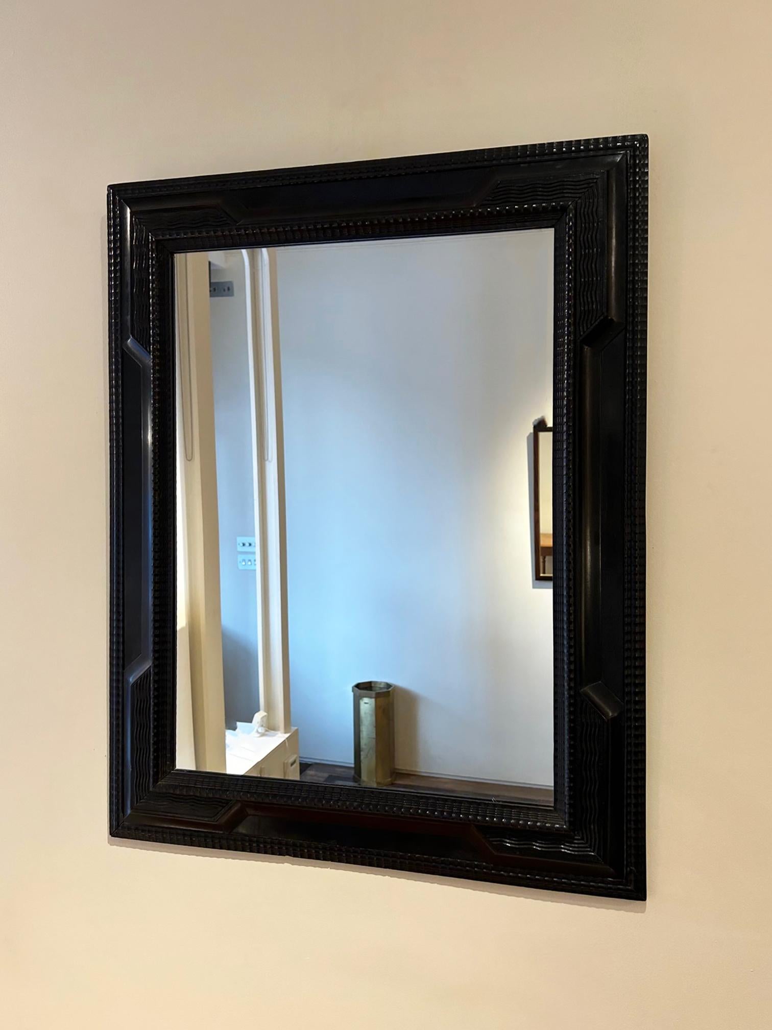 Mid-Century Modern Flemish Style Ebonised Ripple Frame Mirror