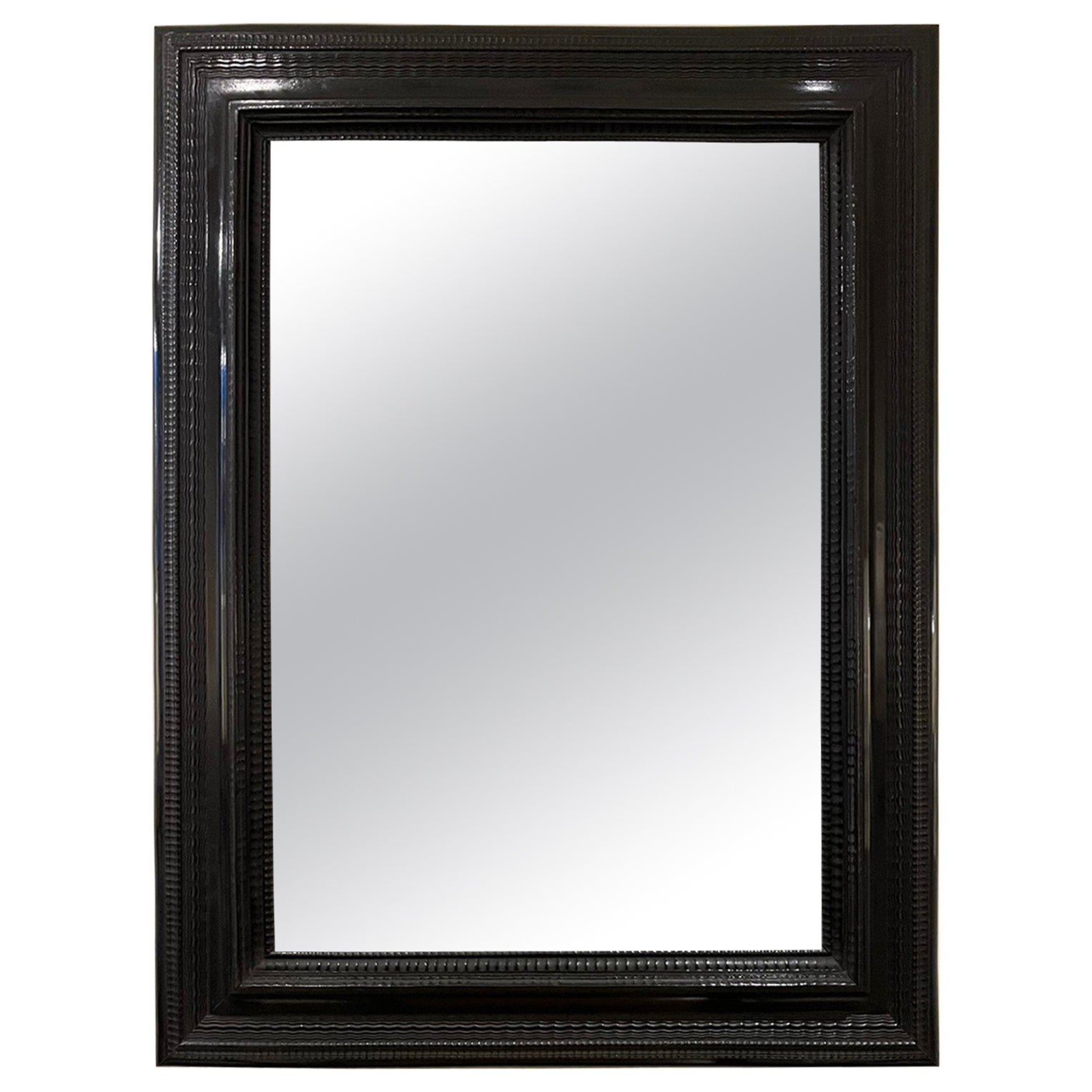 Flemish Style Ebonised Ripple Frame Mirror