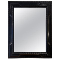 Flemish Style Ebonised Ripple Frame Mirror