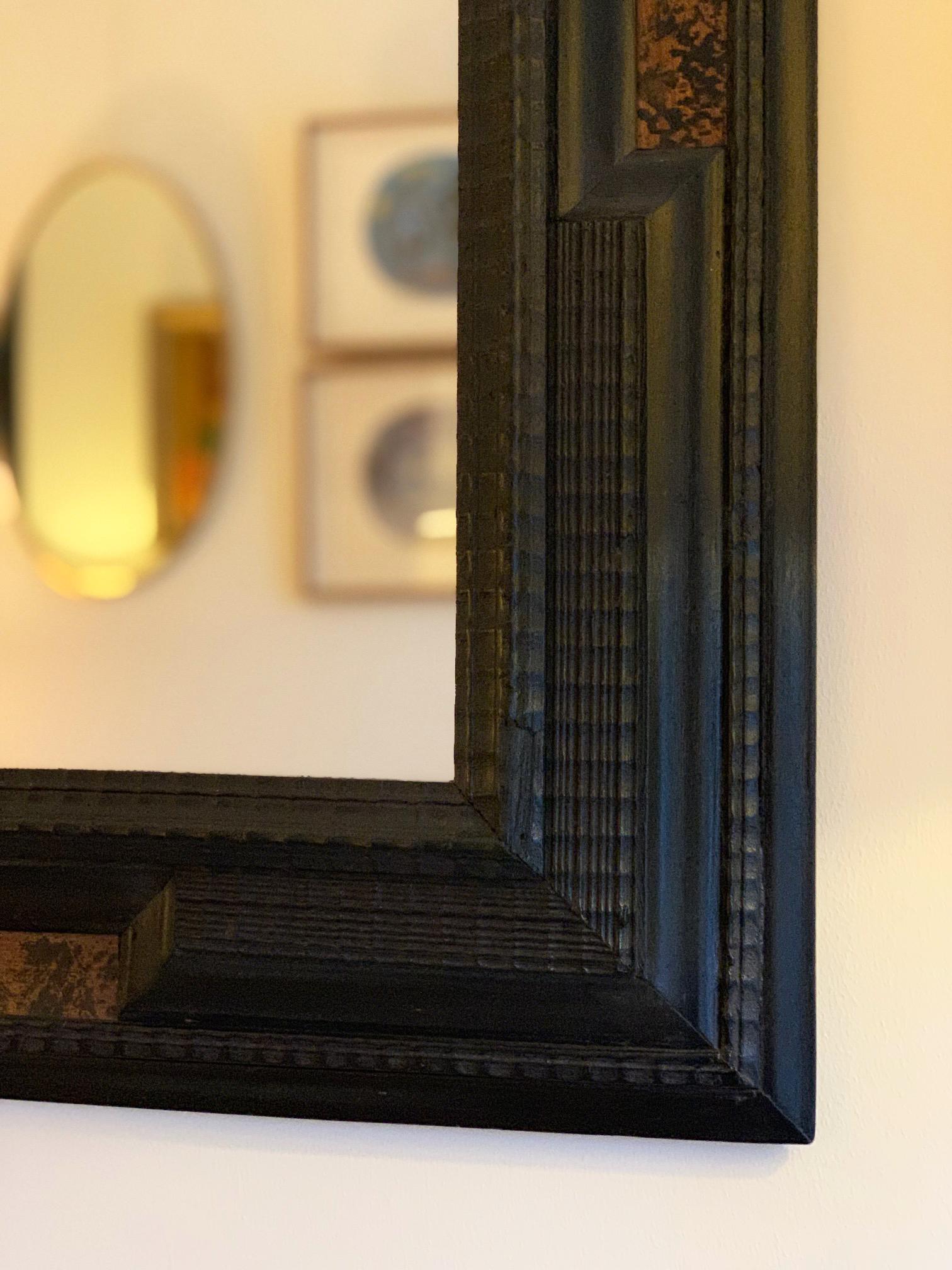 20th Century Flemish Style Faux Tortoishell and Ebonised Ripple Frame Mirror