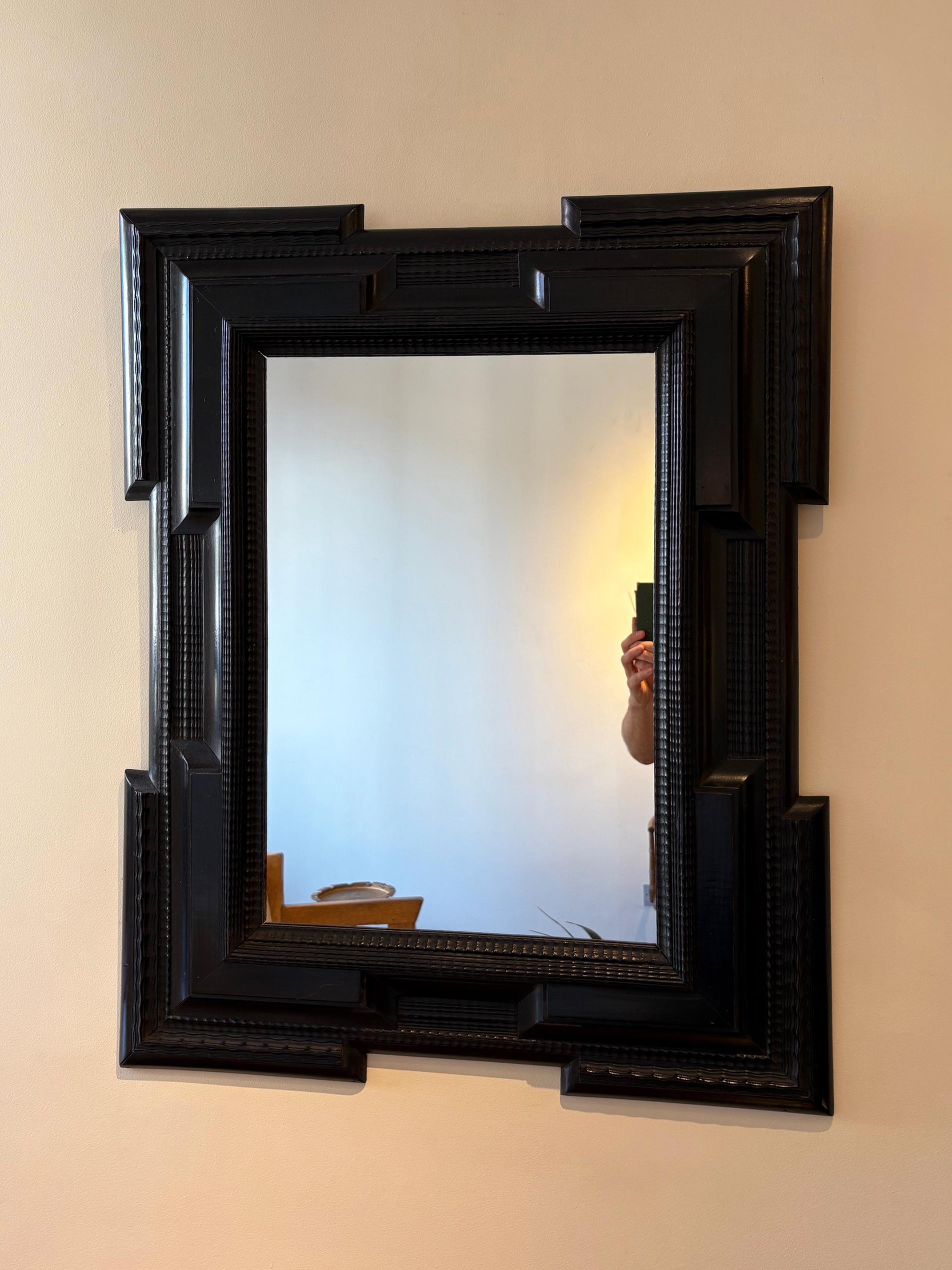 A Flemish style ripple frame mirror
Italy, first half of the 20th Century
New mirror glass and backing.
