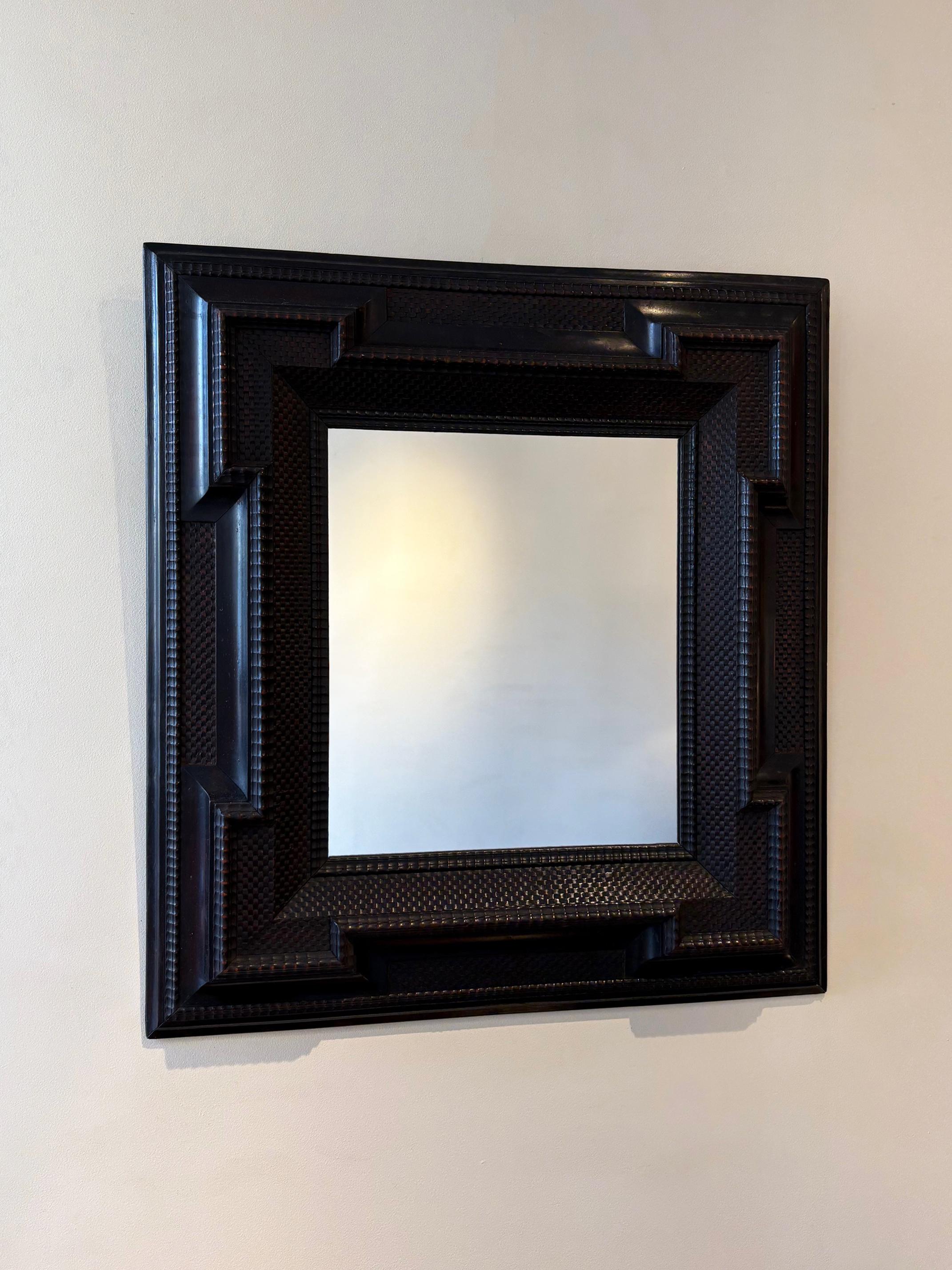 A Flemish style ripple frame mirror
Italy, Circa 1920
New mirror glass and backing.
