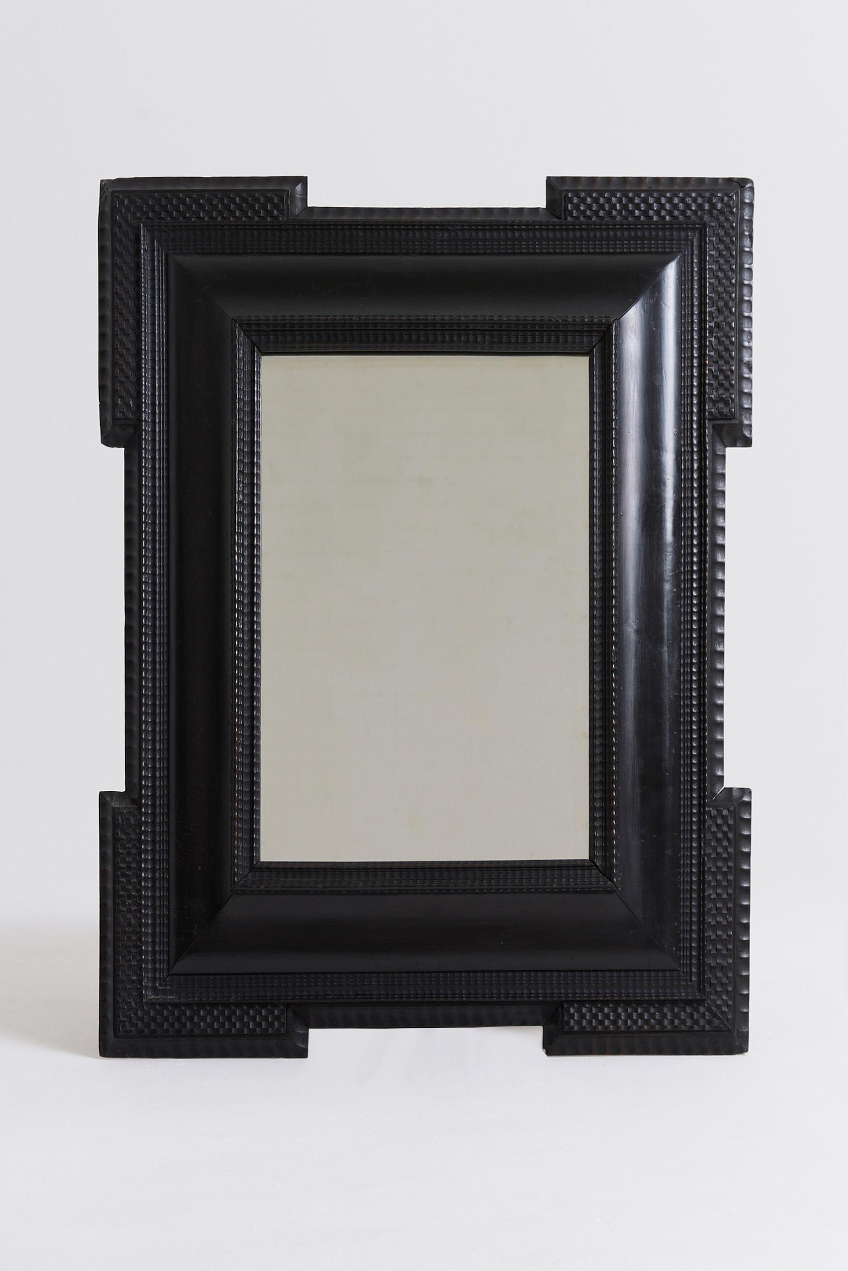 A Flemish style ripple frame mirror
Italy, first half of the 20th Century
New mirror glass and backing.
