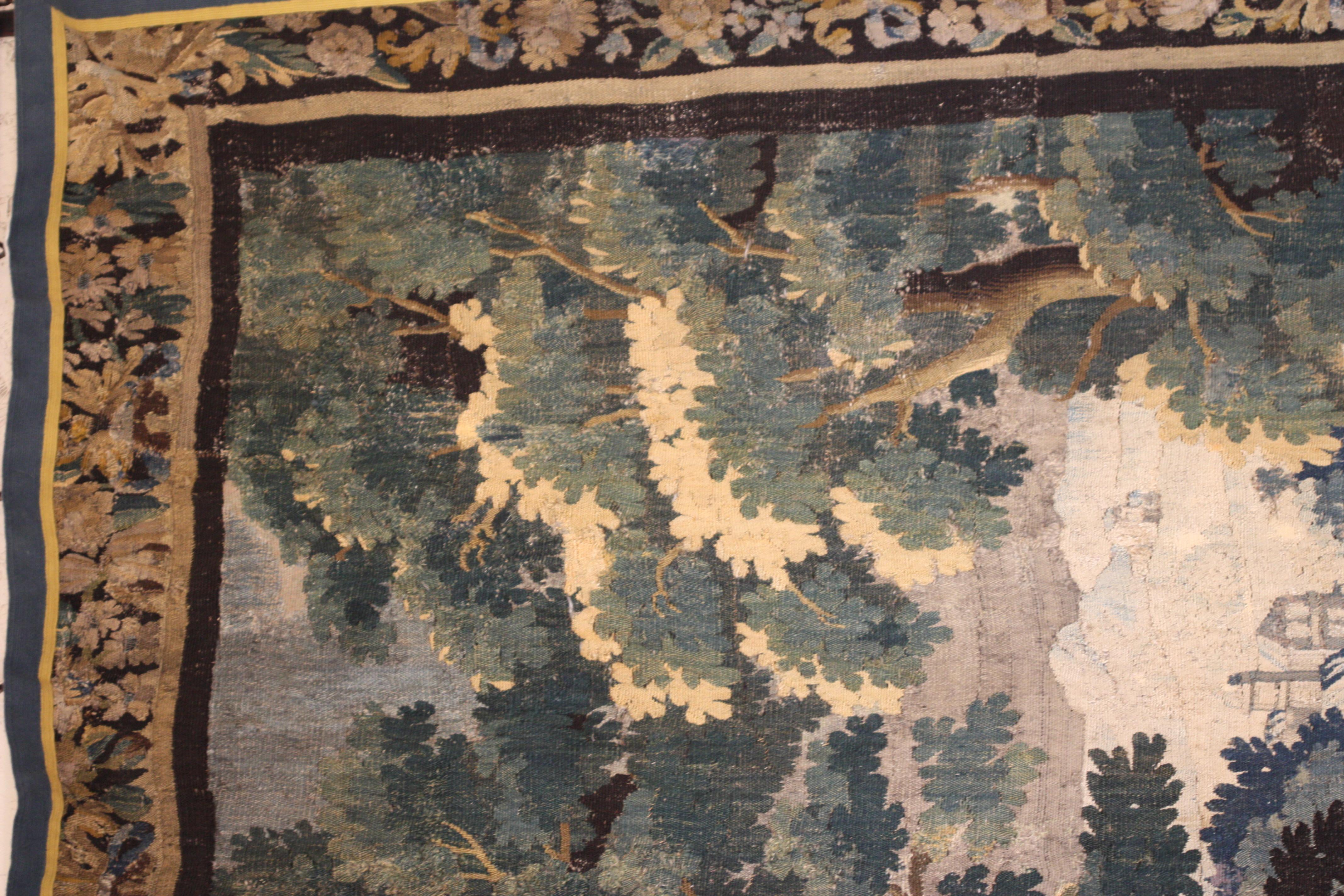 
Flemish Verdure Tapestry, 18th Century.
depicting two cranes in a wooded landscape, with a romantic castle in the distance. Some repairs. 8 ft. 1 in. (246.38 cm.) by 58 in. (147.32 cm.)