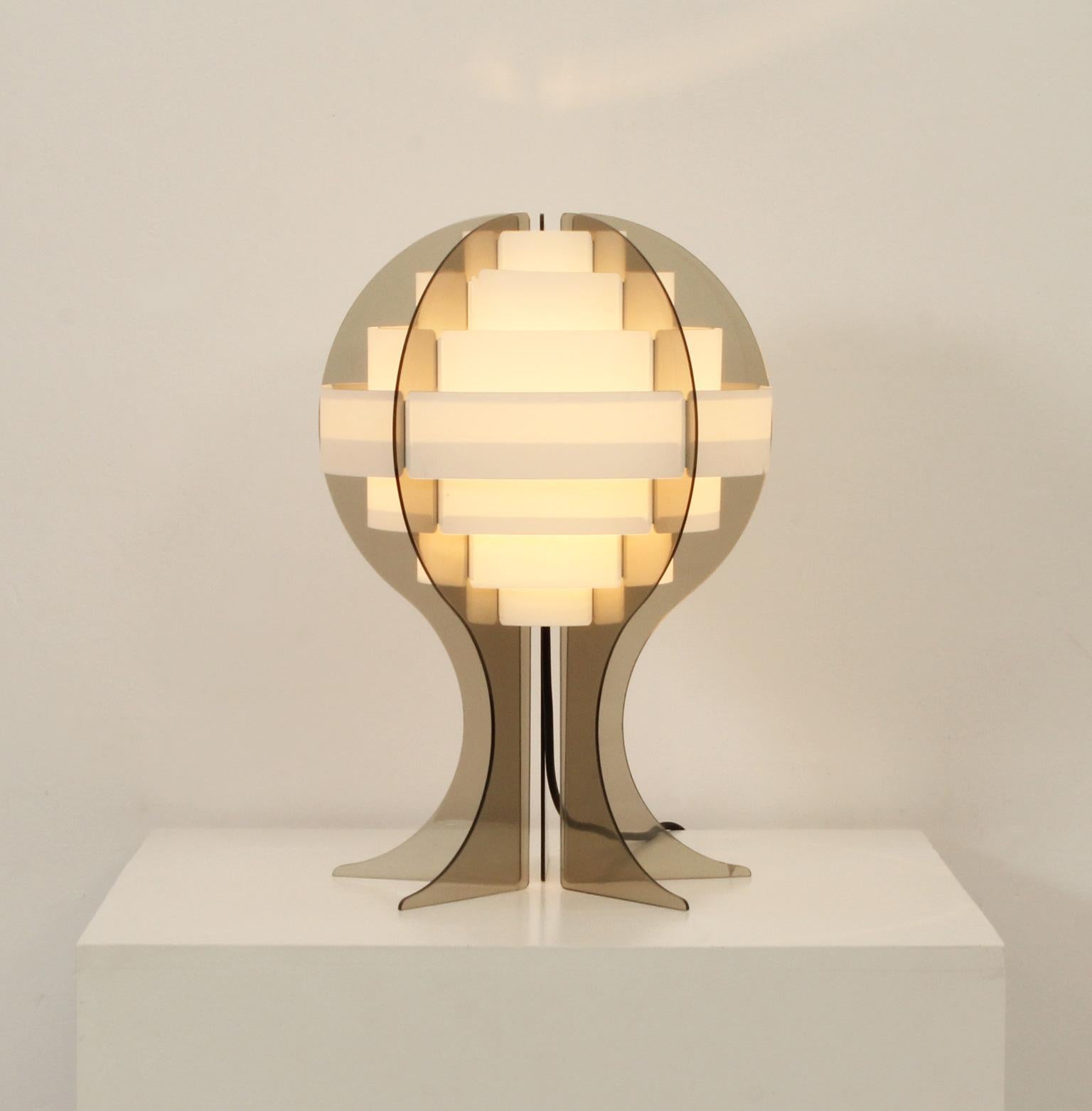 Table lamp designed in 1960's by Flemming Brylle and Preben Jacobsen. Denmark. Made of sheets of smoked methacrylate and white acrylic.