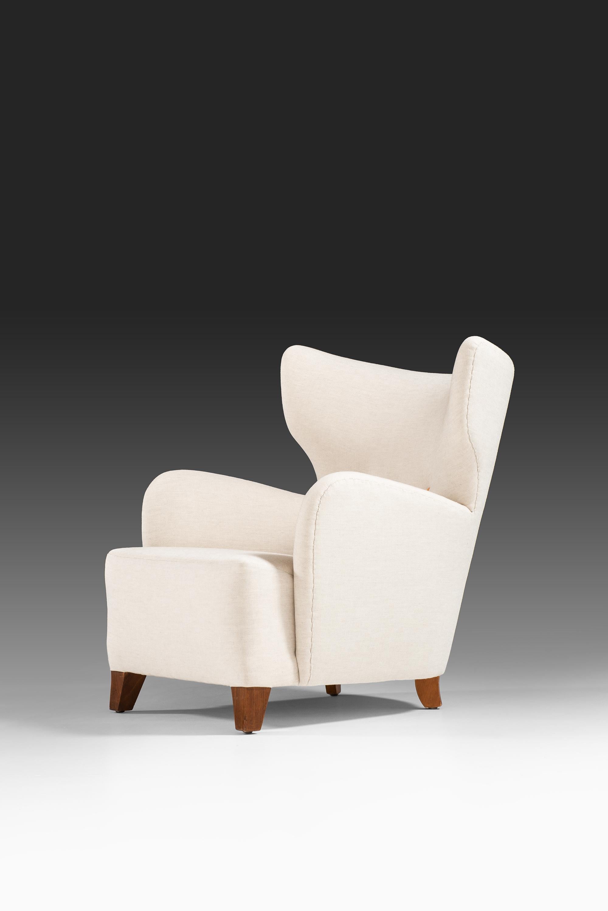 Flemming Lassen Attributed Pair of Wingback Easy Chairs Produced in Denmark 3