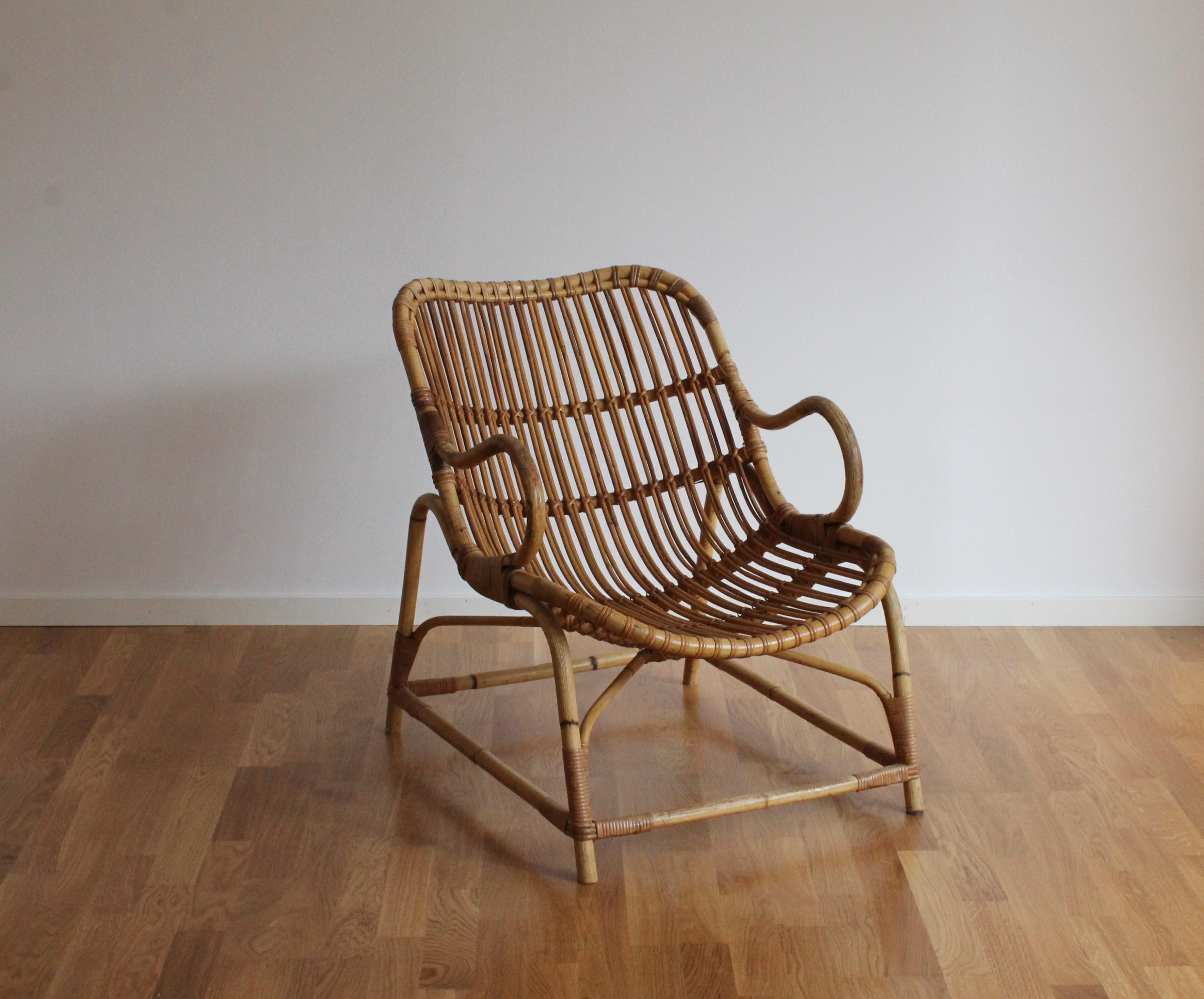An early example of Flemming Lassen's iconic Bamboo chair model 340. This example is lightly restored, near the original condition. Produced by E. V. A. Nissen & Co., Denmark. Bears manufacturers metal plaque.

Other Danish designers of the era
