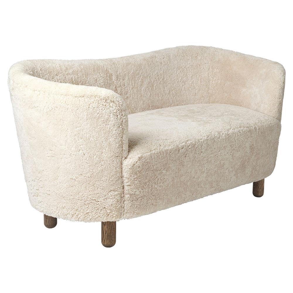 Das Mingle-Sofa wurde 1935 von dem Architekten Flemming Lassen (1902-1984) entworfen und im selben Jahr beim Wettbewerb der Copenhagen Cabinetmakers' Guild vorgestellt. In der Fachzeitschrift 