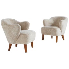 Flemming Lassen Pair of Easy Chairs in Beige Sheepskin, 1940s Flemming Lassen Pair of Easy Chairs in Beige Sheepskin, 1940s