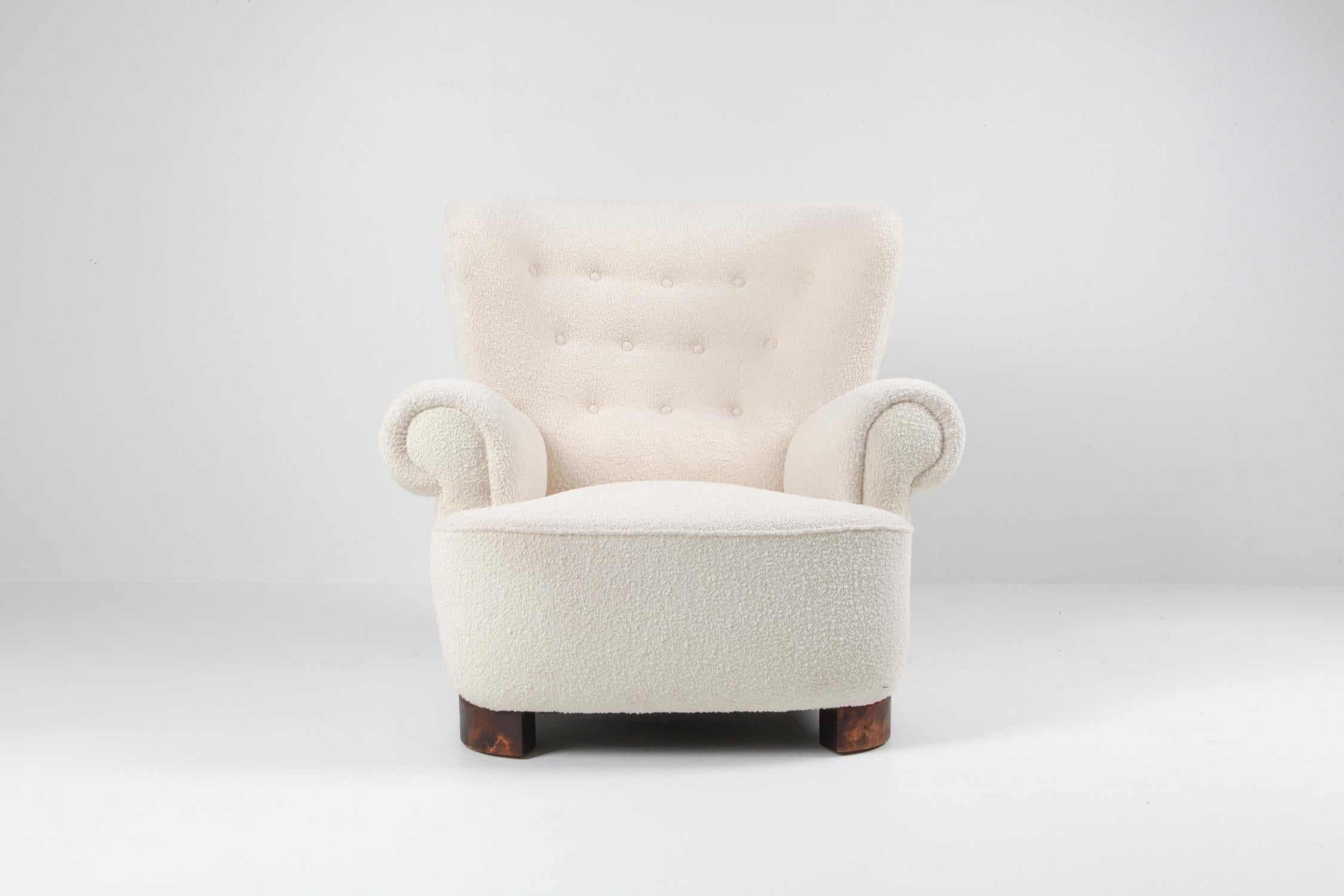 Danish; Scandinavian design; Mid-Century Modern: Flemming Lassen; armchair; lounge chair; wingback chair; Denmark

Scandinavian Modern lounge armchair, in the style of Flemming Lassen. The extravagant wingback is made for a grand interior. This