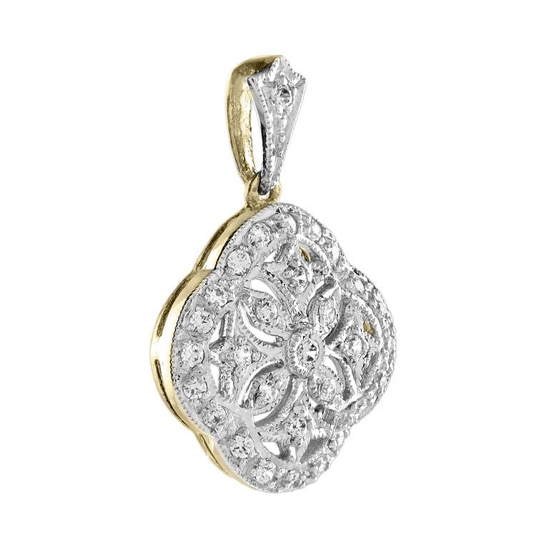 This fantastic pendant was made with antique design inspiration. The top of this pendant is crafted in white gold which gives it strength and the neutral white color, and it is affixed yellow gold back which was popular in the Edwardian era.