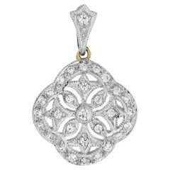 Pendentif en or bicolore 14 carats et diamants