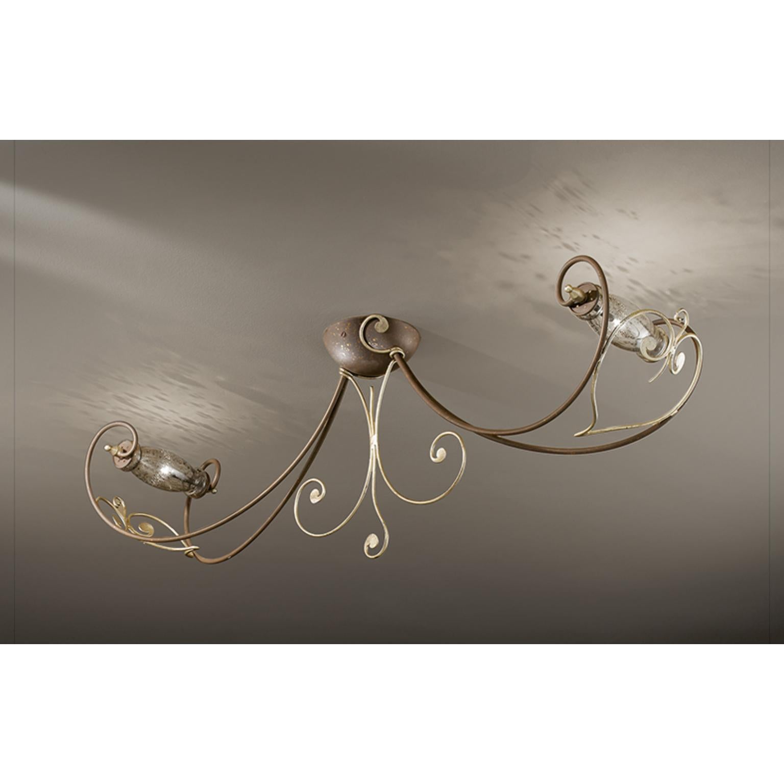 Fleur Botte Ceiling Lamp by MM Lampadari
Dimensions: D 25 x W 107 x H 35 cm.
Materials: Metal, crystal, and Murano glass.

Different finishes are available. All our lamps can be wired according to each country. If sold to the USA it will be wired
