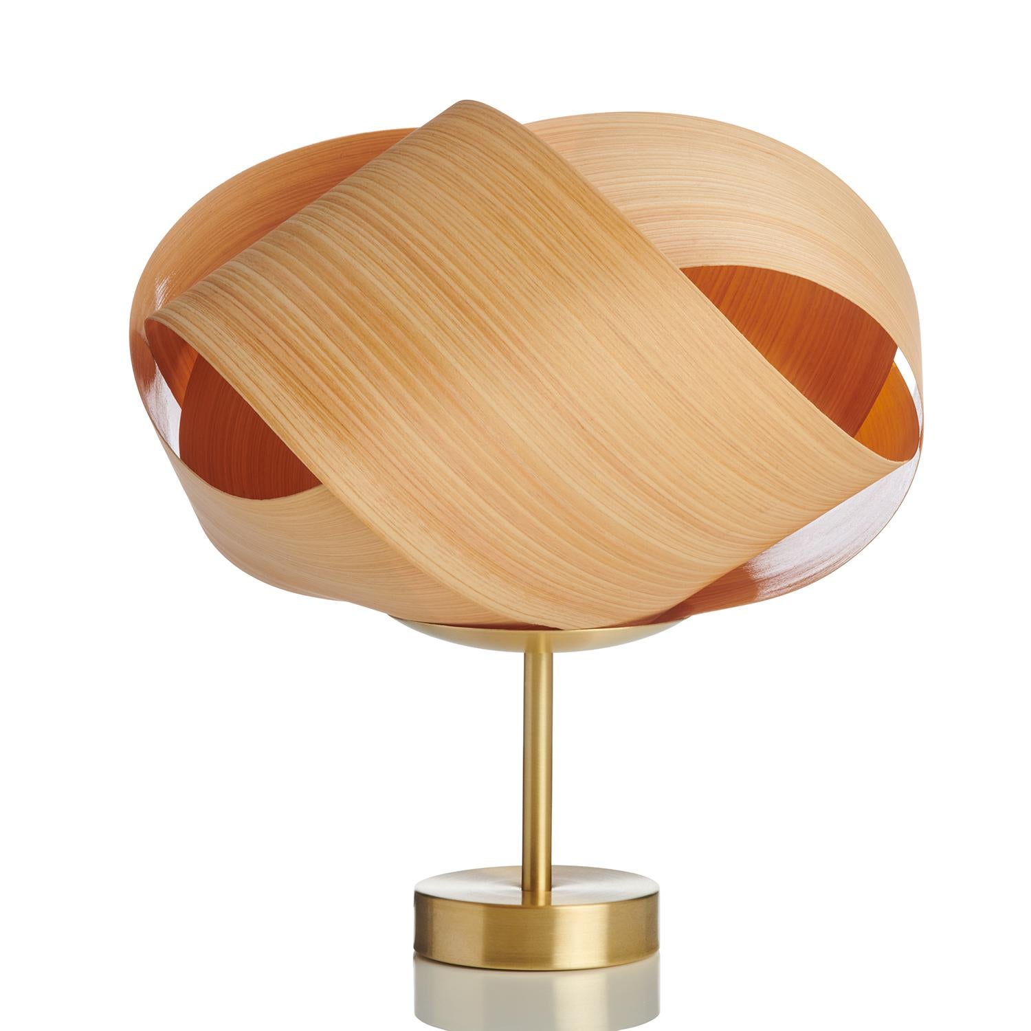 FLEUR is a Danish Modern wood veneer side light. This small contemporary table lamp can be used as a luxury piece for a bar, side table, alcove, or as bedside lighting. This Organic, Scandinavian Design is customized with several wood veneer