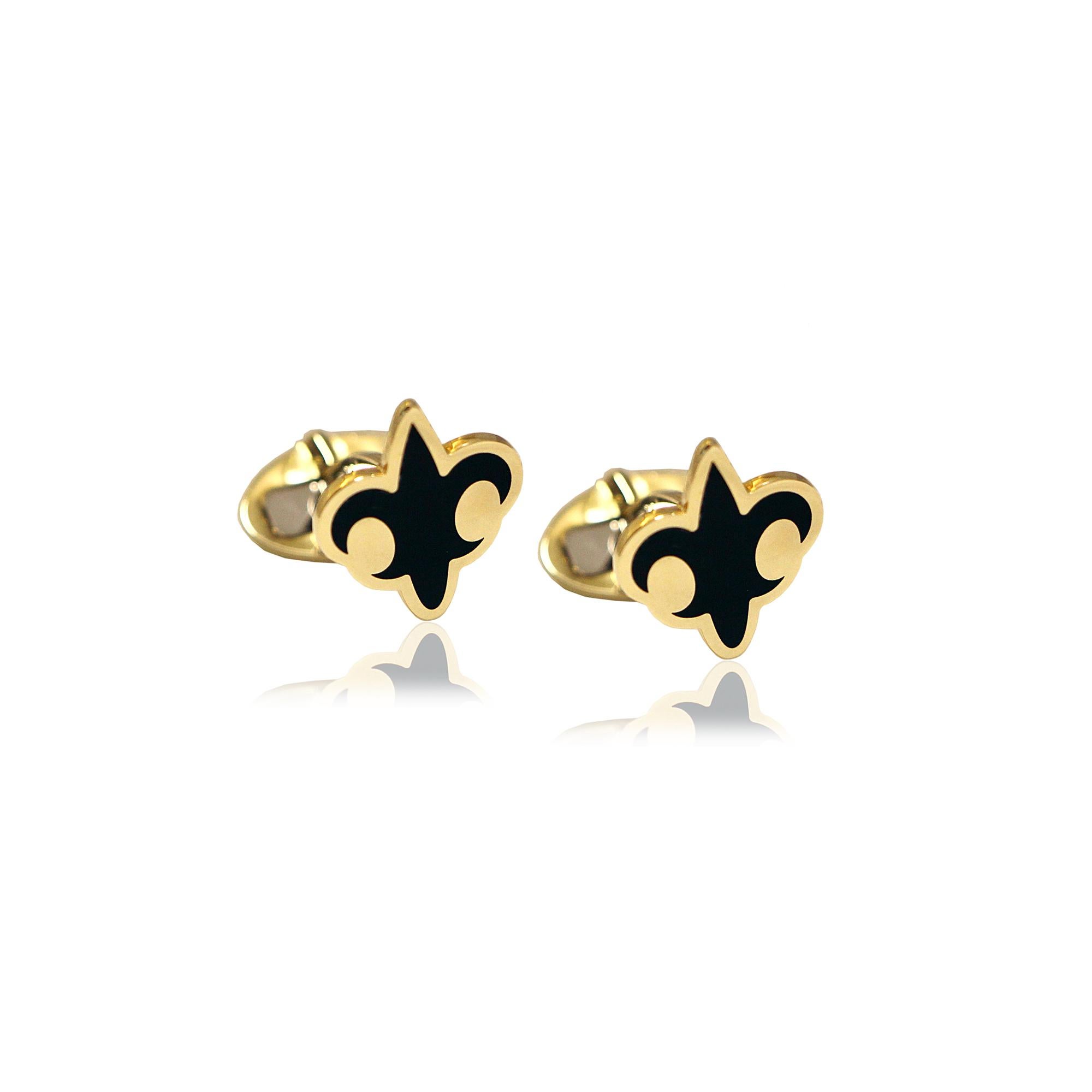 Fleur De Lis shape cufflinks handcrafted in 14Kt yellow gold, featuring a black enameling - cerachrom - centre. The black ceramic and gold combination absorbs and reflects the light all around you. These beautiful cufflinks belong to Metalloplasies