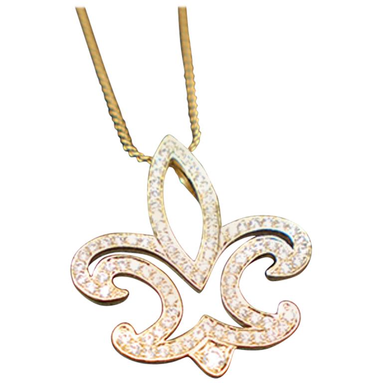 Sapphire and Diamond Fleur de Lis Pendant, Necklace 18 Karat and Chain