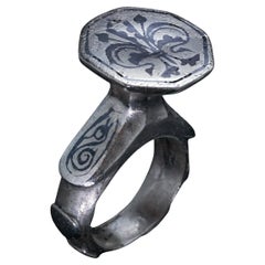 Used Fleur de Lis Motif Silver and Niello Medieval Ring 1300 - 1400