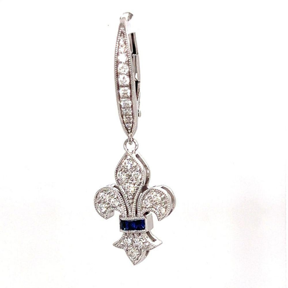 Fleur De Lis Sapphire Earrings

Fleur De Lis, translated from French is flower of the lily, is a symbol that has been used by royalty and signifies many things such as loyalty, purity and majesty. These sapphire and diamond earrings are perfect for