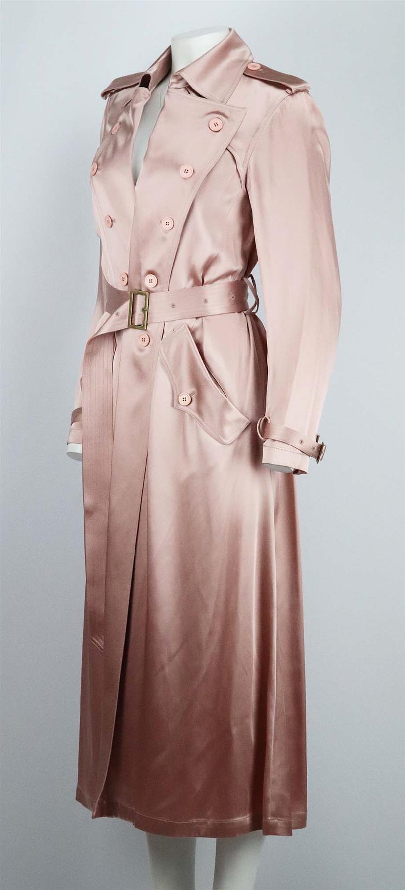 This trench coat by Fleur du Mal is made from lustrous pink satin that drapes beautifully and creates such an elevated vibe, it's designed in a slightly loose, double-breasted silhouette and has traditional shoulder epaulettes and buckle-fastening