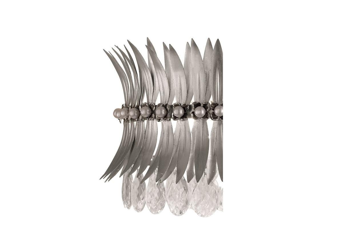 Lampada da parete Fleur Leaves di MM Lampadari
Dimensioni: D 38 x L 20 x H 26 cm. 
Materiali: Vetro e metallo.

Sono disponibili diverse finiture di metallo. Tutte le nostre lampade possono essere cablate a seconda del Paese. Se viene venduto negli