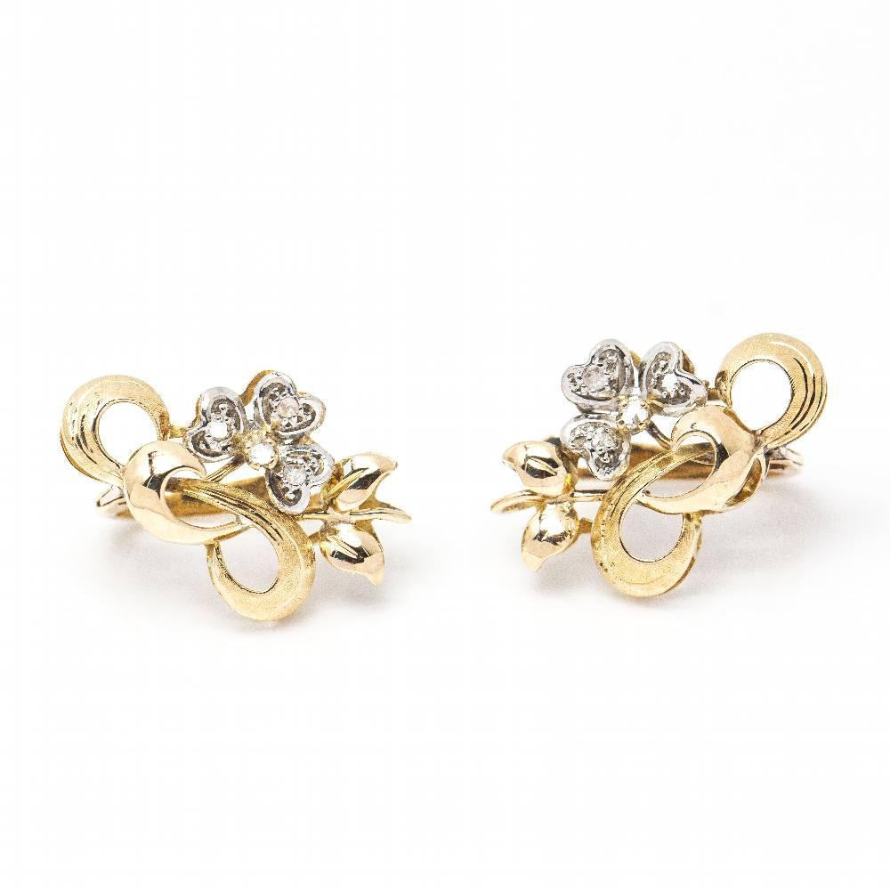 Original 1910's Platinum and Yellow Gold Earrings for women  8x Antique Cut Diamonds  Catalan Clasp  18kt Yellow Gold and Platinum  3,55 grams  Measures: 1,5cm long and 1,00cm wide  These earrings are in excellent condition, with no visible wear and