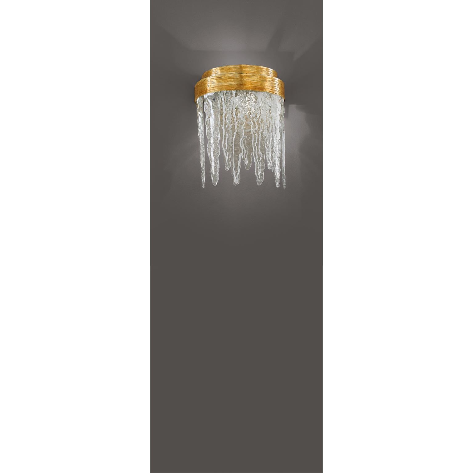 Lámpara de pared Fleur Stallattite de MM Lampadari
Dimensiones: P 18 x An 27 x Al 39 cm. 
Materiales: Metal y vidrio vertido martillado.

Todas nuestras lámparas pueden cablearse según cada país. Si se vende a EE.UU., se cableará para ese país, por