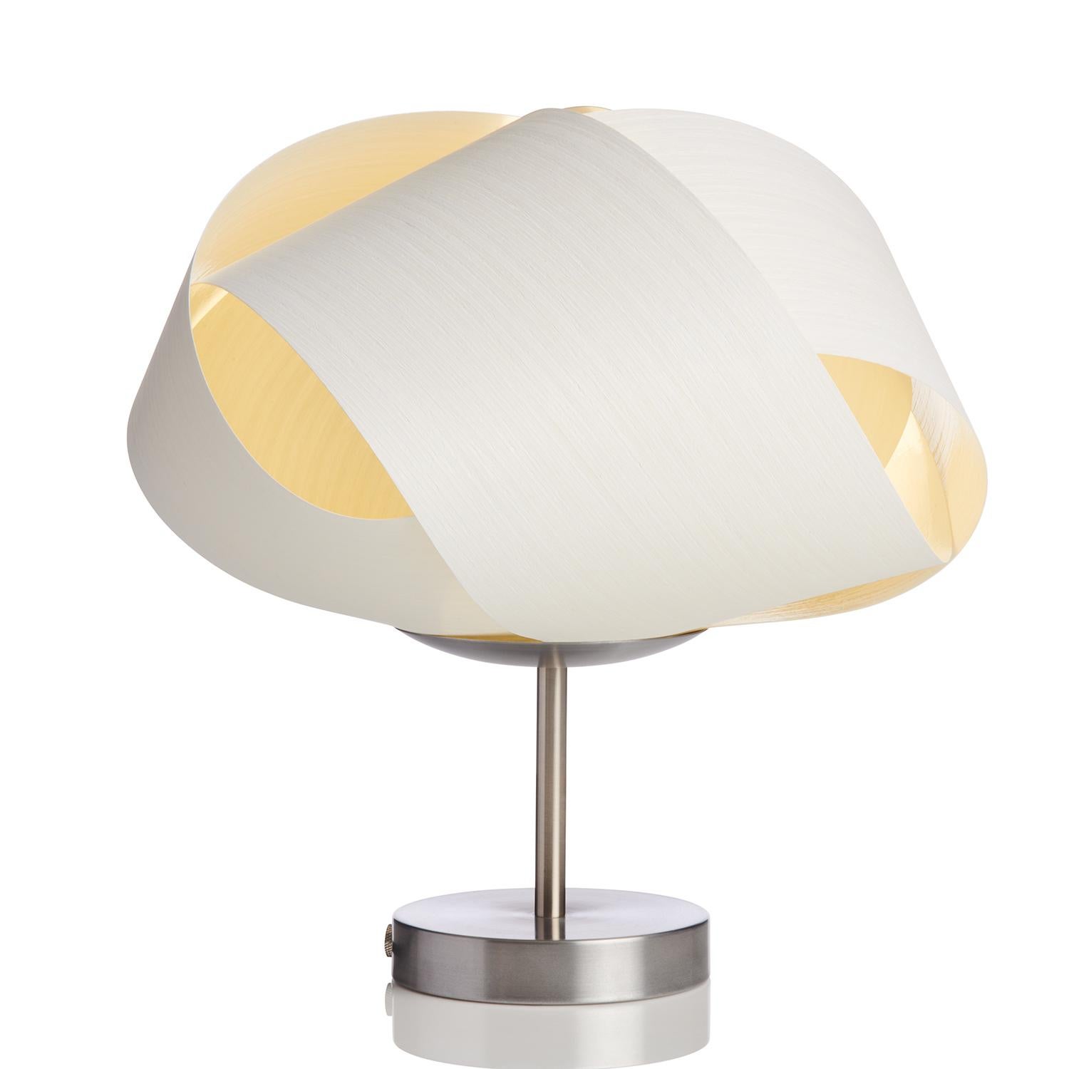 FLEUR is a Danish Modern wood veneer side light. This small contemporary table lamp can be used as a luxury piece for a bar, side table, alcove, or as bedside lighting. This Organic, Scandinavian Design is customized with several wood veneer