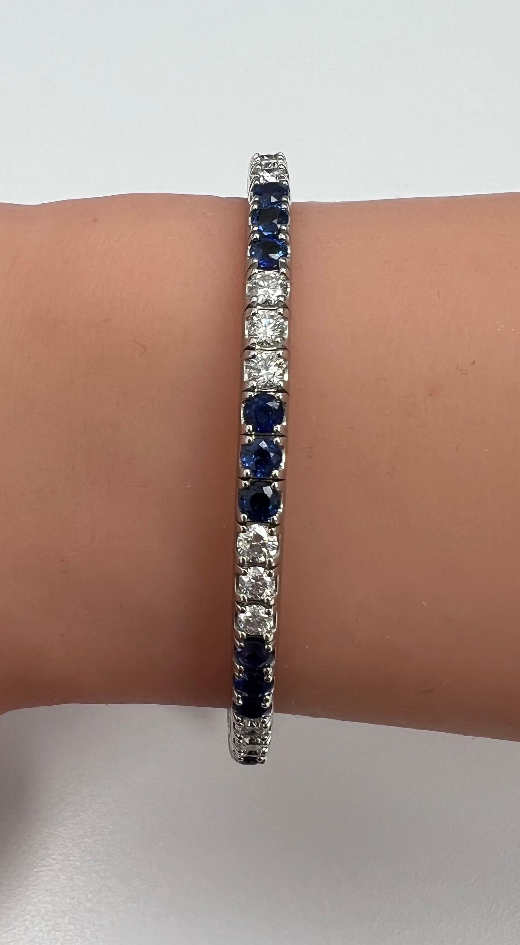 Flex Stretchable Bangle Bracelet in 14k White Gold With Natural Diamonds & Blue Sapphires
This exquisite 14k white gold flex bracelet is a true masterpiece of elegance and sophistication. The bracelet features a seamless design that allows for