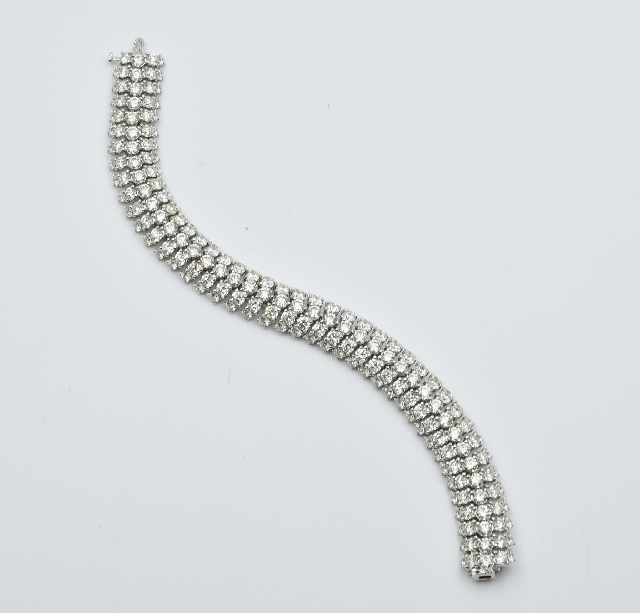 Round Cut Flex Bracelet with 25.68 Carat of Staggered Diamond Rows in 18 Karat White Gold