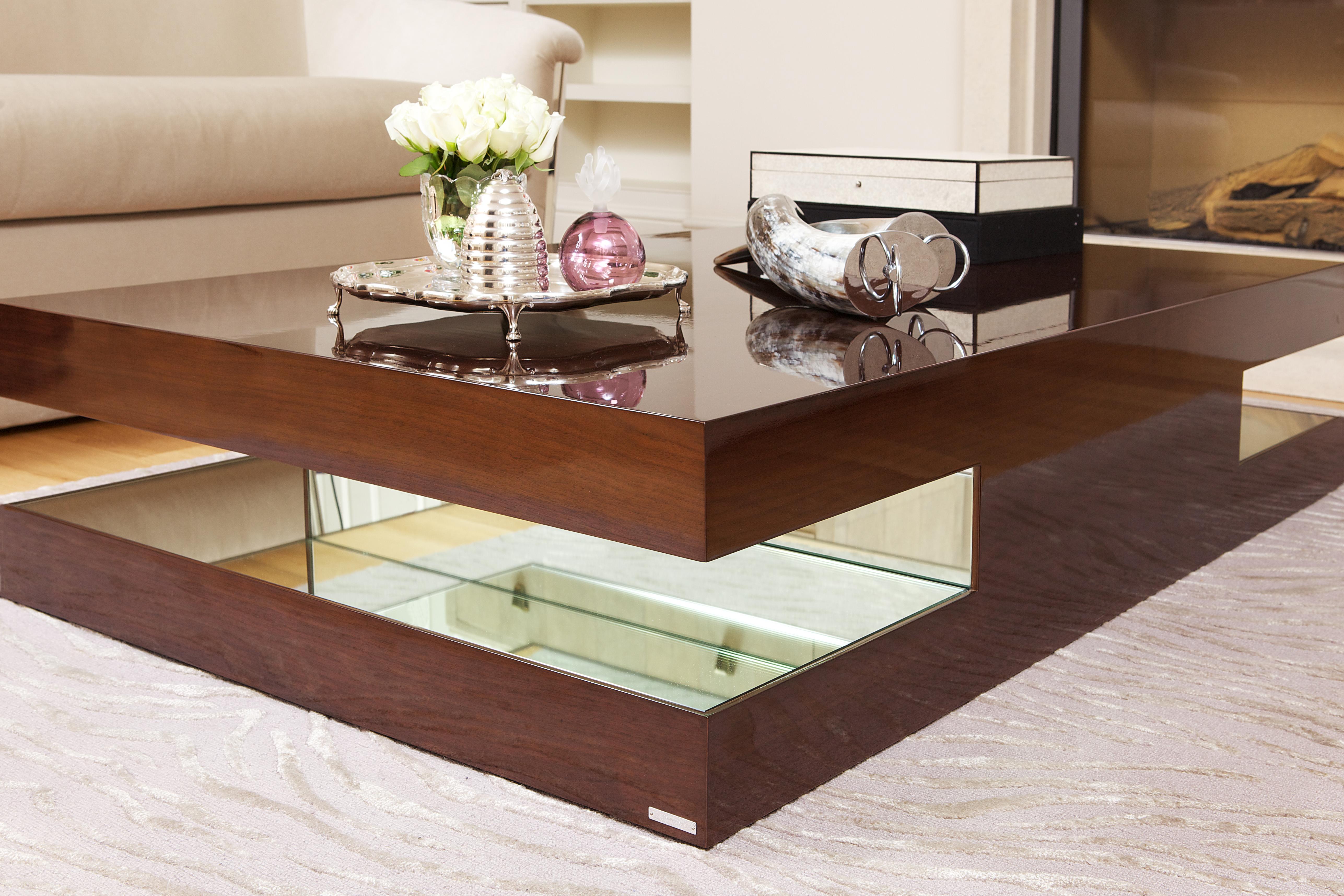 Coffee Table in wengé with mirror inlay.


Bespoke / Customizable
Identical shapes with different sizes and finishings.
All RAL colors available. (Mate / Half Gloss / Gloss).